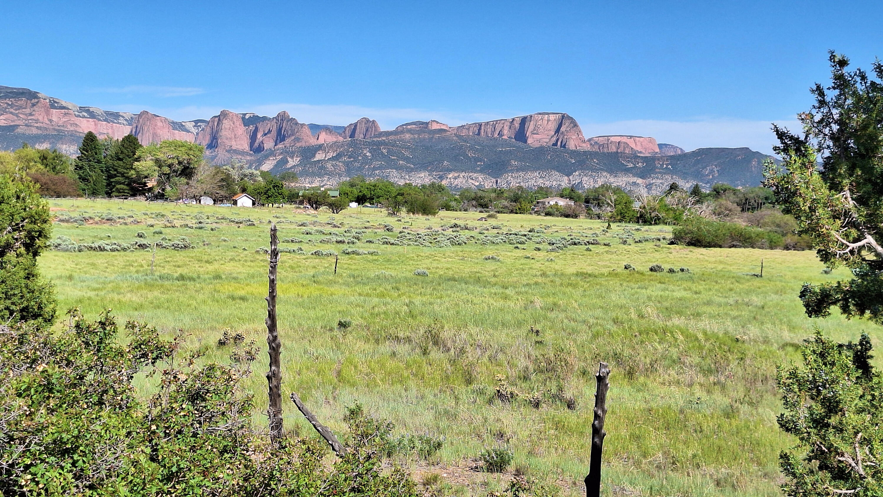 Incredible opportunity to own this idyllic property in New Harmony, Utah. This rare property contains 40.72 acres, plus 7 acre feet of water rights! The views of the red rocks of Kolob are spectacular, especially when viewed through the beautiful pinion pines and Gambrel Oak. Just down the road is the charming little town of New Harmony.  St. George is about 30 minutes away, Las Vegas is about 2 hours. You can see Zion National Park from here, and there are 5 National Parks and 10 State Parks within 200 miles. This is a gorgeous location to relax, go hiking, see the sights, and make this your personal paradise.  Power is at the edge of the property and the owner will need to drill a well to access the water rights. Spend a luxurious afternoon and come see this property today!