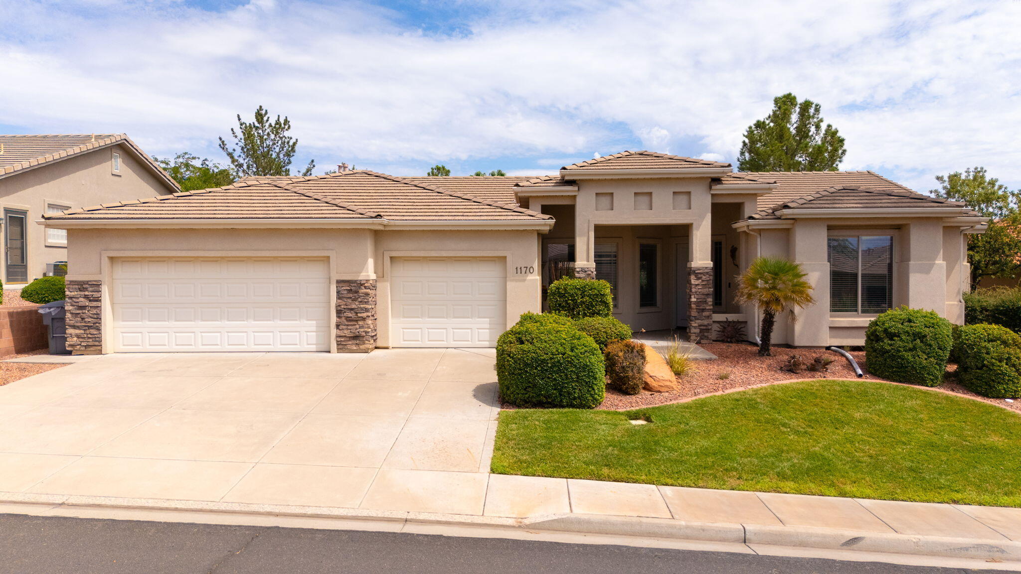One of the most desirable communities in La Jolla Hills in Green Springs next to the golf course! Amazing views surrounds this home with Pine Valley Mountain and red rock formations. Well cared for and pride of ownership throughout! Spacious large rooms with large picture windows over looking lush landscape and palm trees. Open space and gorgeous setting. Large kitchen over looking large open great room. Large primary suite. Enjoy your own resort like retreat with pickle ball courts, pool, hot tub, fitness center. Prime location with proximity to all services!