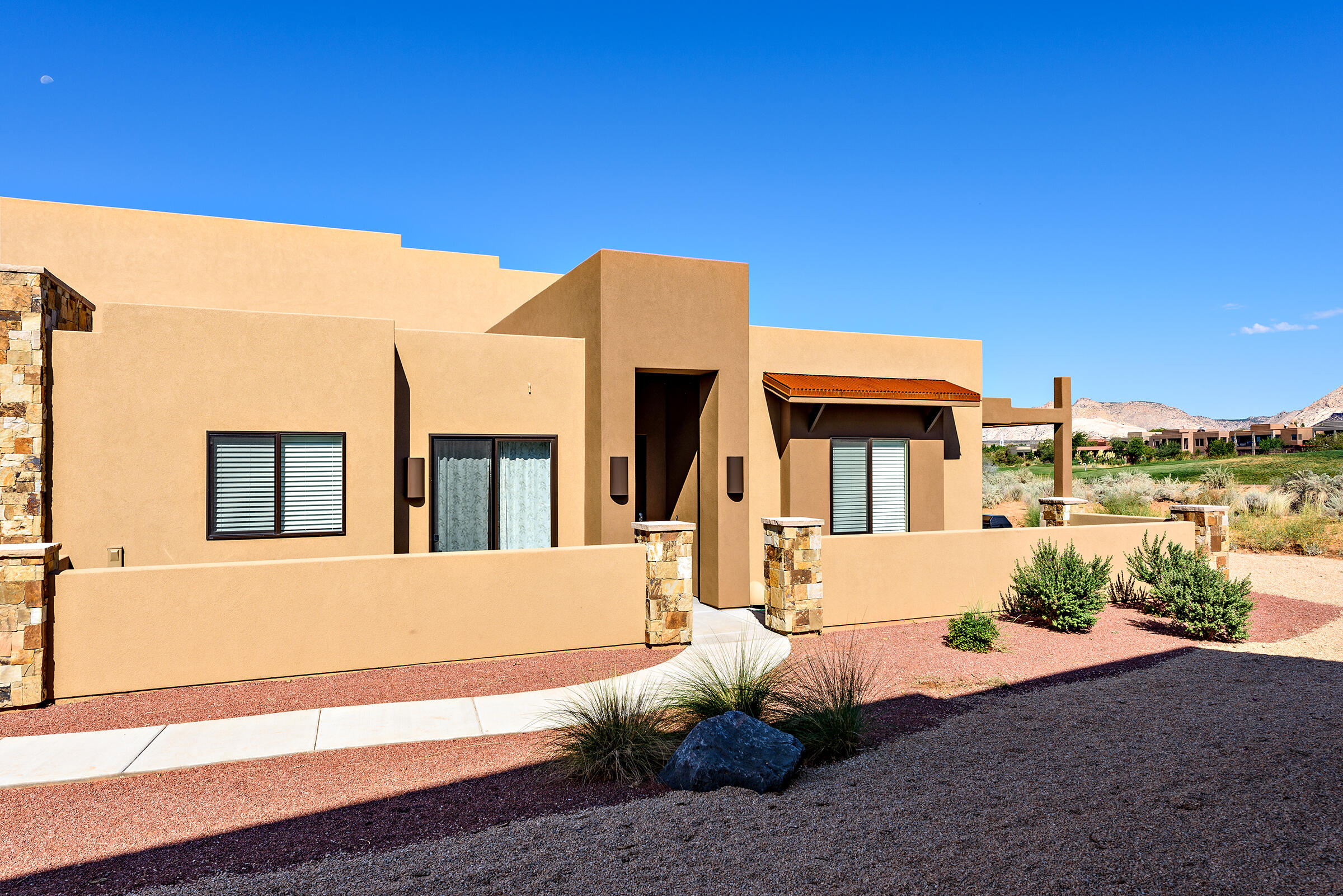 Perched along the 18th hole of the renowned The Ledges Golf Club, this exceptional single-level investment property offers breathtaking golf course and Snow Canyon State Park views. Featuring 3 bedrooms and 2 baths, this fully furnished turnkey retreat is approved for nightly rentals, making it the perfect vacation home or income-producing opportunity. Ideally located just steps from the swimming pool and pickleball courts, this property combines luxury, convenience, and unbeatable scenery in one incredible package.
