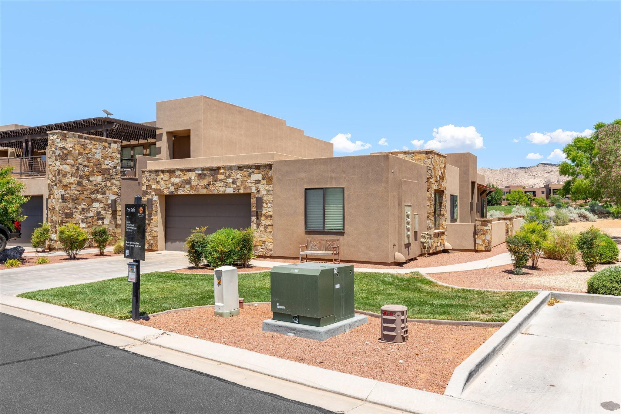 Perched along the 18th hole of the renowned The Ledges Golf Club, this exceptional single-level investment property offers breathtaking golf course and Snow Canyon State Park views. Featuring 3 bedrooms and 2 baths, this fully furnished turnkey retreat is approved for nightly rentals, making it the perfect vacation home or income-producing opportunity. Ideally located just steps from the swimming pool and pickleball courts, this property combines luxury, convenience, and unbeatable scenery in one incredible package.