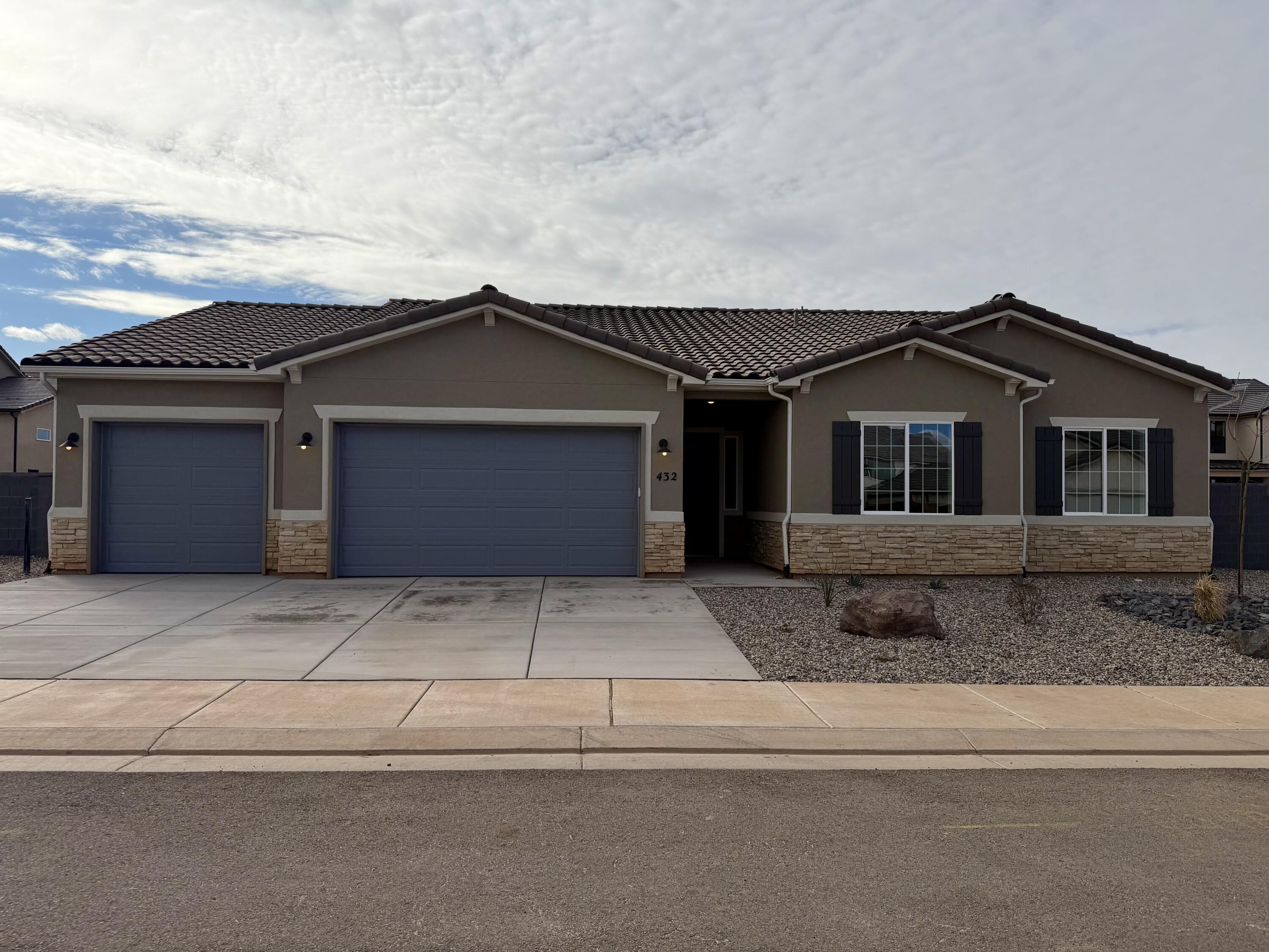 NEW Construction in sought-after area near Crimson Cliffs High School! Builder is offering special financing with Rates as low as 3.99%! The ranch-style Daniel II plan greets guests with a charming covered entry. Inside, you'll find a spacious great room and gourmet kitchen, complete with built-in oven and microwave, center island, and extended dining area/ sunroom. An elegant primary suite featuring an immense walk-in closet and attached bath is separated from three additional bedrooms for privacy. This home also features a covered patio and spacious 4-car tandem garage. Buyer to verify all info.