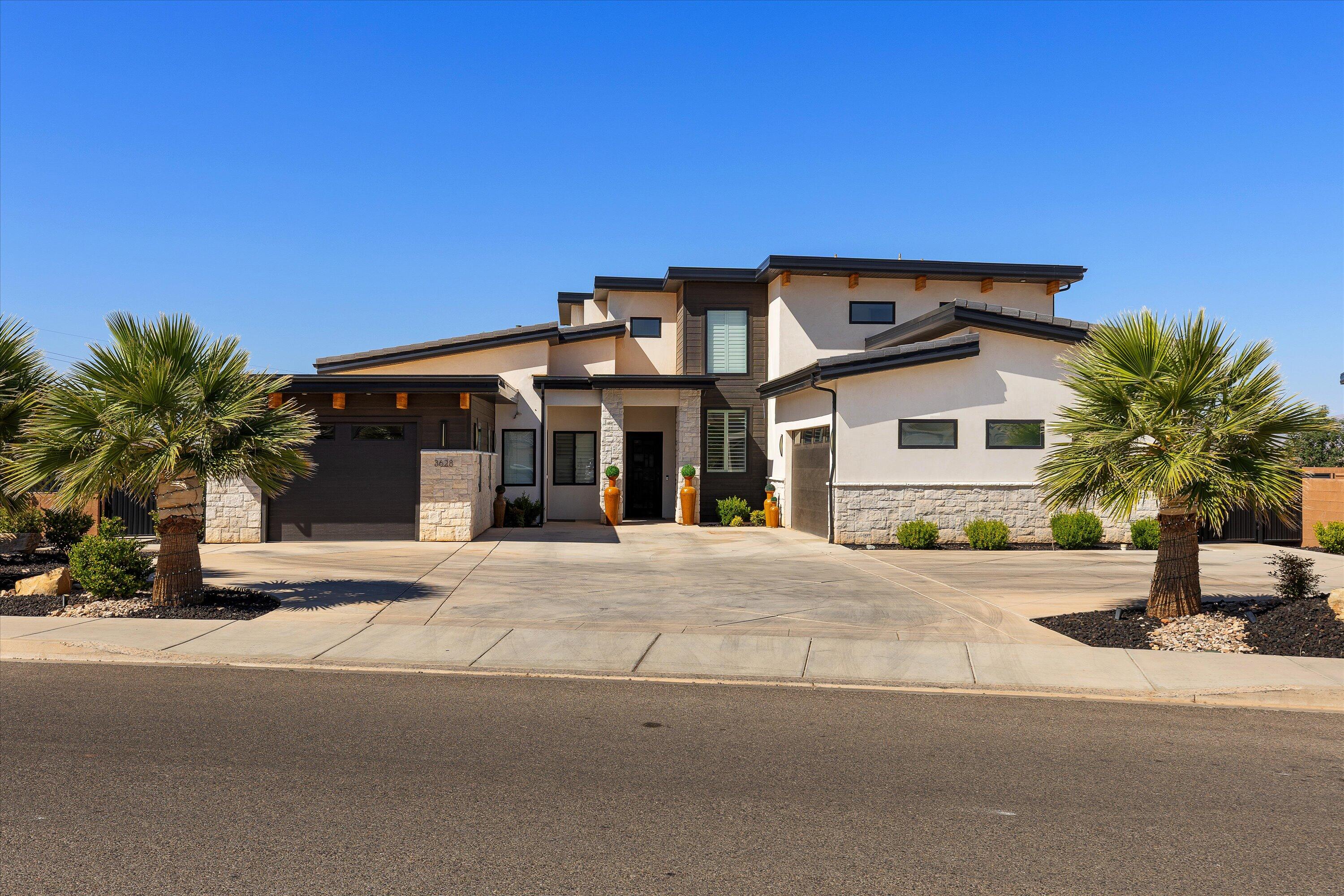 Spacious newer build on a large lot in Washington, UT-directly across from the new Washington Wheels Park. Enjoy stunning views over Washington Fields and endless potential with room to expand. Features a 2 bed/2 bath ADU, ideal for multigenerational living. Backyard is prepped with plumbing for a pool and outdoor kitchen, wiring for exterior lighting, and a covered overhang designed for a future deck.
