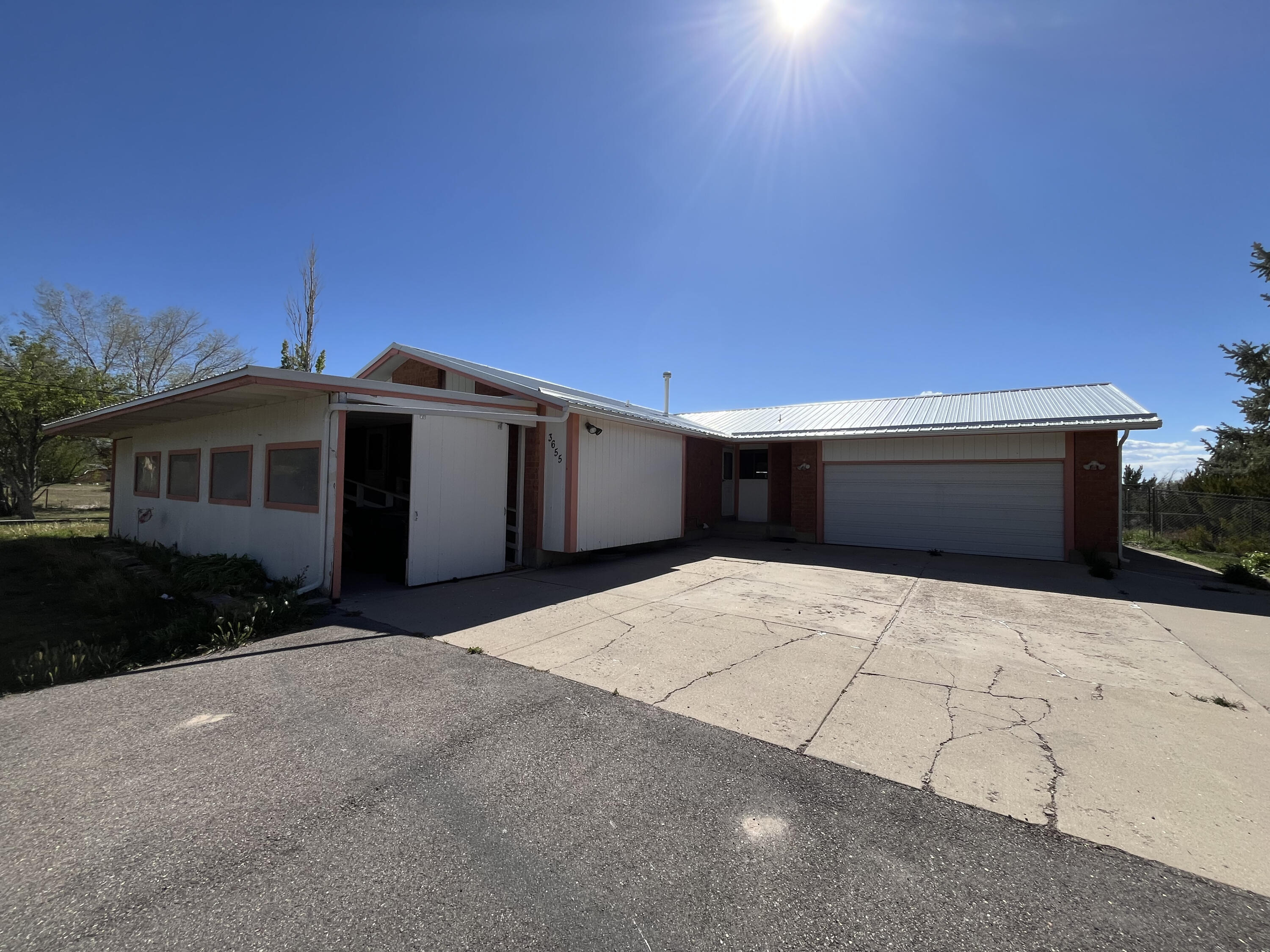 Huge lot, fully fenced and a home with great potential. Full basement ADU with separate entrance, kitchen, full bath and 4 bedrooms. Main floor has kitchen, two bedrooms, kitchen and living room.
