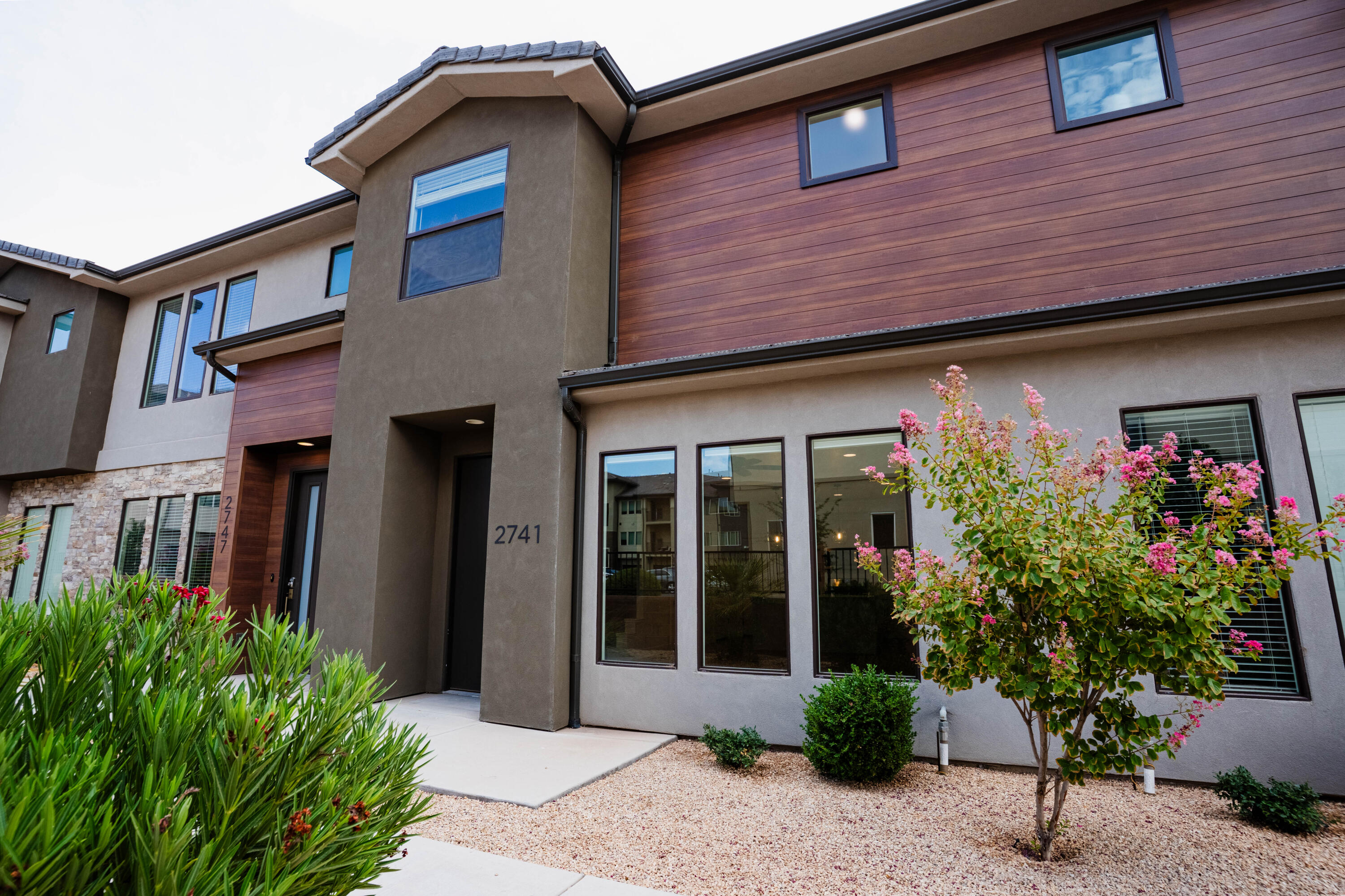Welcome to this beautifully maintained townhome in the highly sought-after Woodland Estates community! Built in 2020, this 3-bedroom, 2.5-bath home offers a bright, open-concept floor plan with modern finishes, abundant natural light, and a spacious living area perfect for everyday living and entertaining. The stylish kitchen flows seamlessly into the dining and living spaces, while the primary suite features a private bath and walk-in closet. A 2-car garage with additional storage provides added convenience. Enjoy resort-style HOA amenities, including a pool, lazy river, hot tub, pickleball courts, parks, and playgrounds. Ideally located near Dino Crossing, shopping, dining, schools, Revere Health, hiking trails, and easy freeway access. Whether you're looking for a primary residence, second home, or investment property, this move-in-ready home offers the perfect blend of comfort, convenience, and lifestyle.