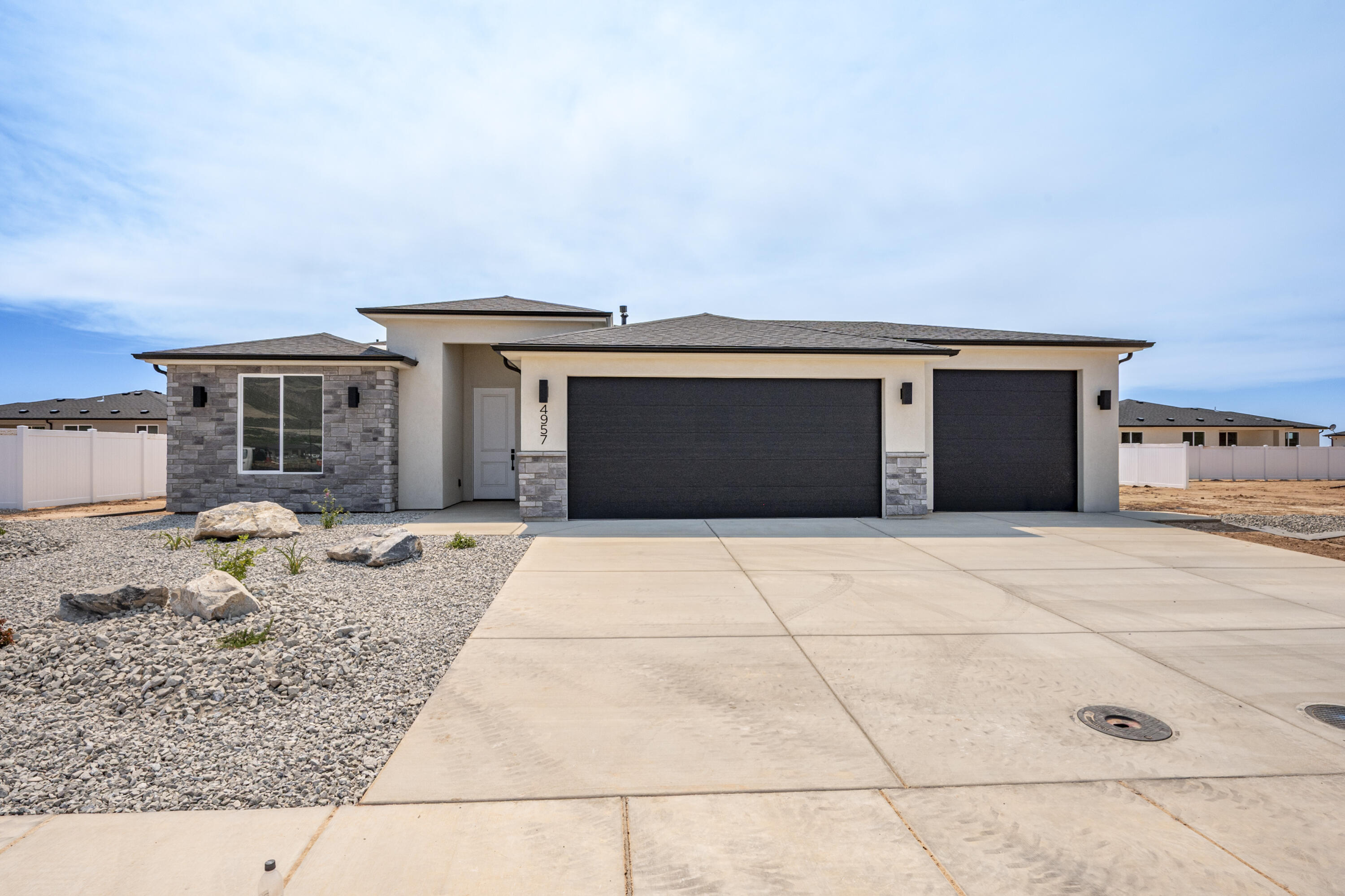 Welcome to The Ammond, a thoughtfully designed single-level home in the growing Valley Gate Estates community. Offering 1,530 sq. ft., this new construction home features 3 bedrooms, 2 bathrooms, and a spacious 3-car garage. The open layout creates seamless flow between the kitchen, dining, and living areas, providing a functional space for everyday living and entertaining. The private primary suite includes a walk-in closet and ensuite bathroom for added comfort. Designed with quality craftsmanship and modern finishes, this move-in-ready home also includes front landscaping, backyard fencing, and refrigerator for added convenience and value. Ask about our preferred lender incentives.