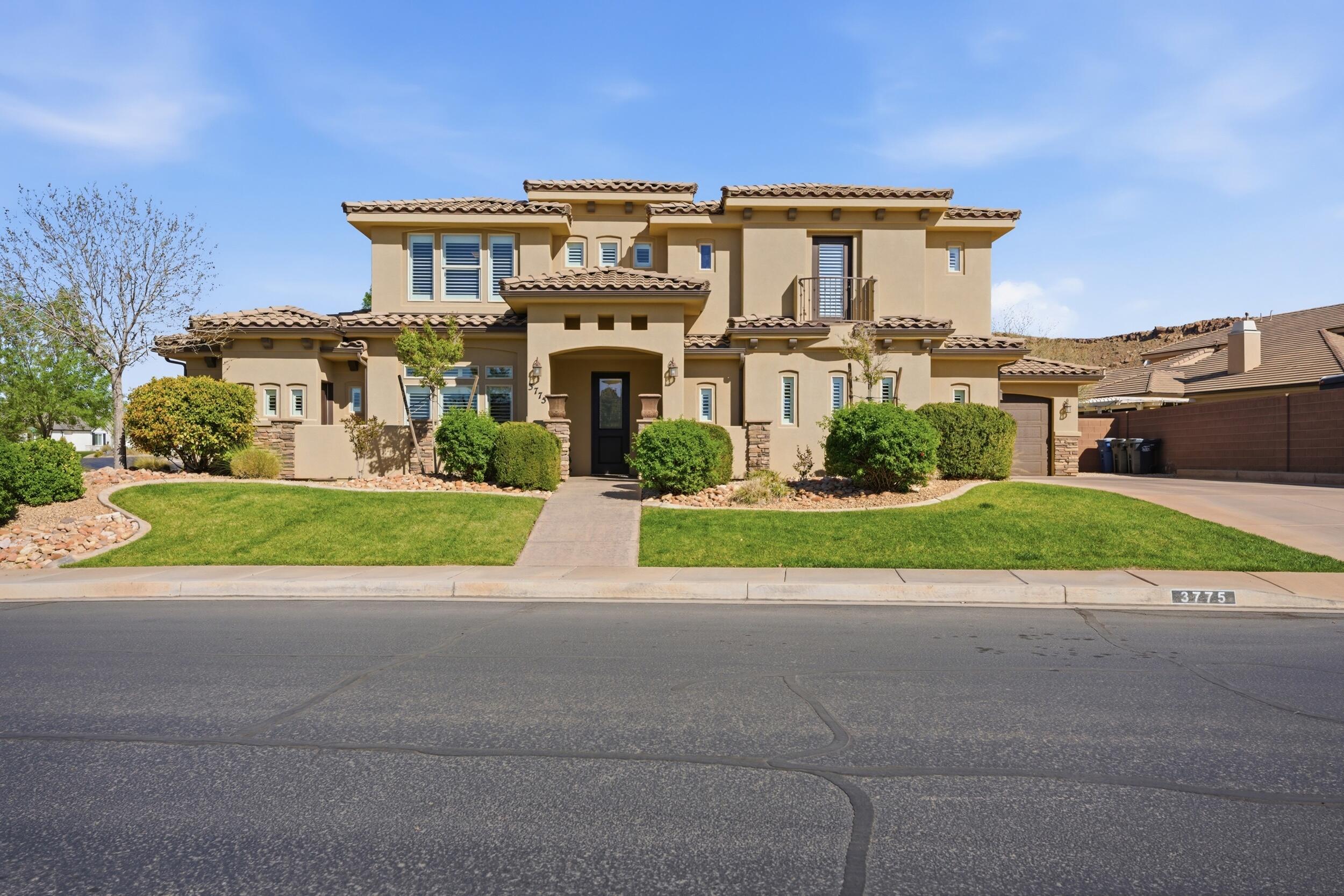 Beautiful Southern Utah home offering comfort, style, and exceptional livability. Bright and meticulously maintained, this property features two spacious family rooms, providing ample space for relaxing or entertaining. A cozy fireplace anchors the inviting main living area, perfect for cooler desert evenings.

The kitchen is both functional and elegant, featuring granite countertops, ample cabinetry, and a layout that flows seamlessly into the main living spaces. Plantation shutters throughout add timeless style while enhancing natural light and privacy. A custom hibachi grill and cover for the gas range adds a unique and versatile touch for cooking and entertaining.

The primary suite offers a peaceful retreat with a luxurious garden tub, ideal for unwinding at the end of the day.

Step outside to a private backyard retreat. Thoughtfully positioned, the home offers exceptional privacy with no neighboring windows looking directly into the yard. The covered patio provides the perfect space for dining, relaxing, or entertaining year-round.

Additional features include an upstairs game room setup complete with pool table, accessories, and mounted TV. The home is equipped with two refrigerators (kitchen and casita), an electric vehicle charger in the garage, a deep third-car garage, and five large garage storage shelves.

The attached casita offers a private living space with a flexible two-room setup, ideal for a bedroom and living area, along with a large bathroom and walk-in closet. Perfect for guests, extended family, aging parents, or a college student.

Clean, bright, and move-in ready, this home blends thoughtful design, privacy, and everyday comfort in a highly desirable Southern Utah setting.