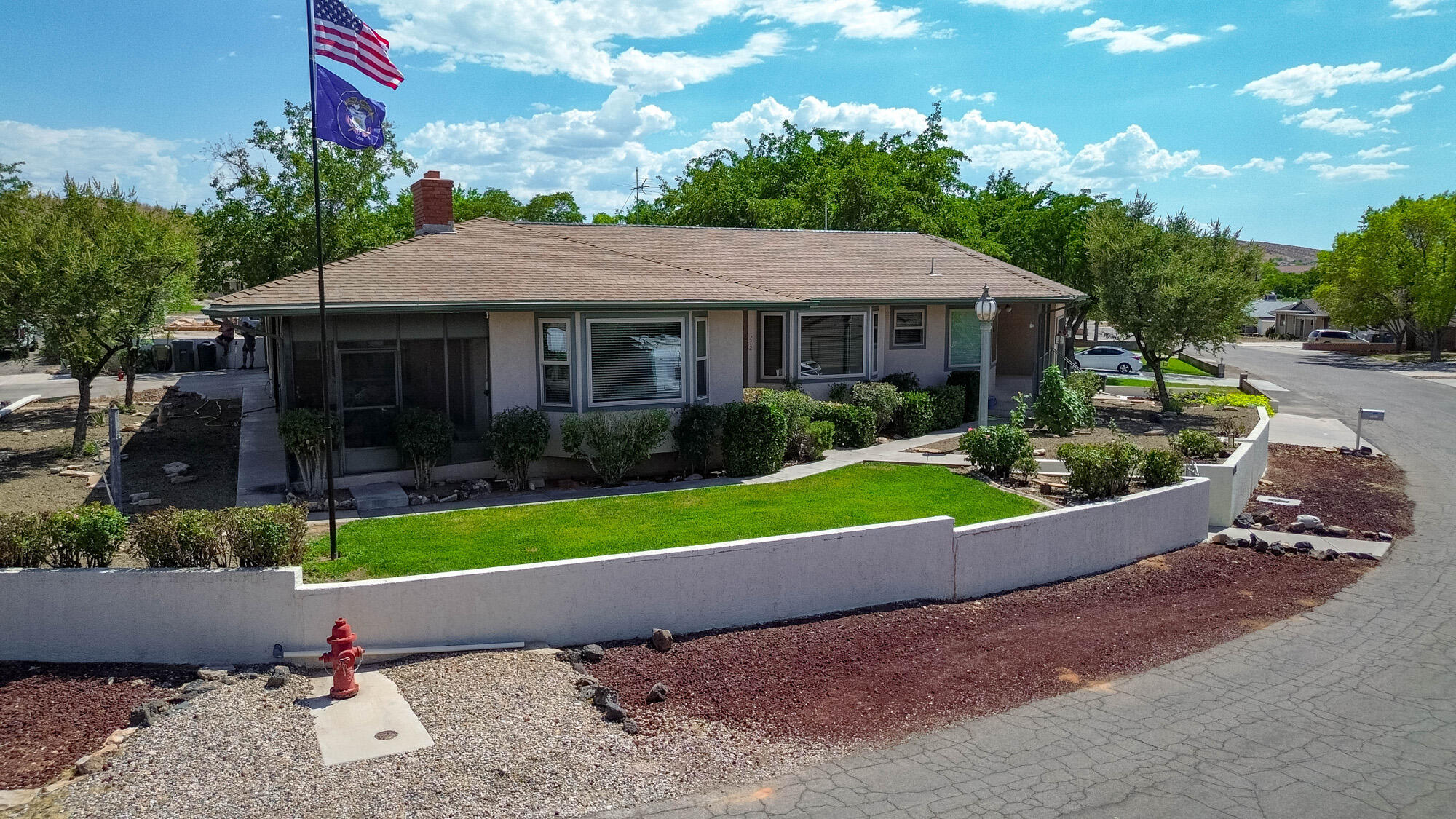 Welcome home to this beautifully maintained 1,787 sq. ft. corner-lot property offering the perfect blend of comfort, functionality, and location. Featuring 3 spacious bedrooms and 2 bathrooms, this home provides abundant storage with a dedicated office, separate storage room, and an oversized 4-car garage. Bring all your toys--there's also convenient RV parking on the expansive .29-acre lot. Enjoy breathtaking mountain views from the home's thoughtfully positioned windows, designed to minimize direct sunlight while filling the interior with natural light. Step outside to your private backyard retreat, complete with a charming gazebo that's perfect for relaxing or entertaining family and friends. Located in a well-established neighborhood with no HOA, you'll appreciate being just minutes from schools, parks, shopping, dining, and other everyday conveniences. Excellent freeway access makes commuting a breeze while maintaining the peaceful feel of a quiet residential community. This exceptional property truly has it all!