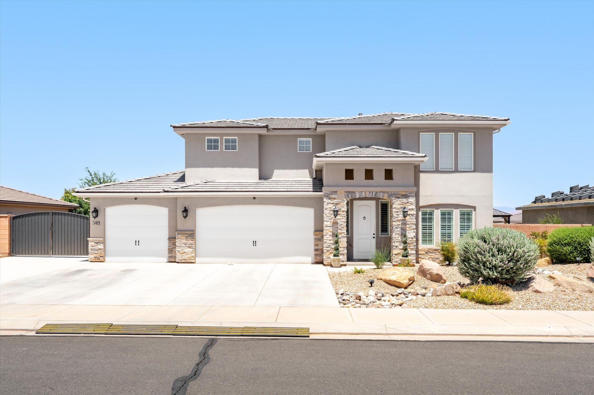Welcome to Rosewood Estates, where space, quality, and views come together in one meticulously maintained home. Thoughtfully designed with 4 bedrooms, 2.5 bathrooms, and multiple living areas, this residence offers room to gather, relax, and grow.
The open-concept main level features soaring ceilings, abundant natural light, a spacious great room, and a beautifully appointed kitchen with rich cabinetry, granite countertops, a large island, and generous storage. The main-level primary suite provides a peaceful retreat with dual vanities, a soaking tub, oversized walk-in closet, and plenty of space to unwind.
Upstairs, you'll find additional bedrooms and a large family room perfectly positioned to capture stunning views of the surrounding landscape. One of the property's most valuable features is its unobstructed backdrop. The home backs directly to a school, preserving the expansive views and providing peace of mind that no future homes will be built behind you.
Pride of ownership is evident throughout, with meticulous care and maintenance at every turn. Energy efficiency and year-round comfort are enhanced by extra attic insulation, while the oversized garage, RV parking, and gated side access provide exceptional flexibility for vehicles, toys, and storage.
Combining beautiful views, thoughtful upgrades, spacious living, and a highly desirable Rosewood Estates location, this is a home that offers both comfort today and confidence for years to come.