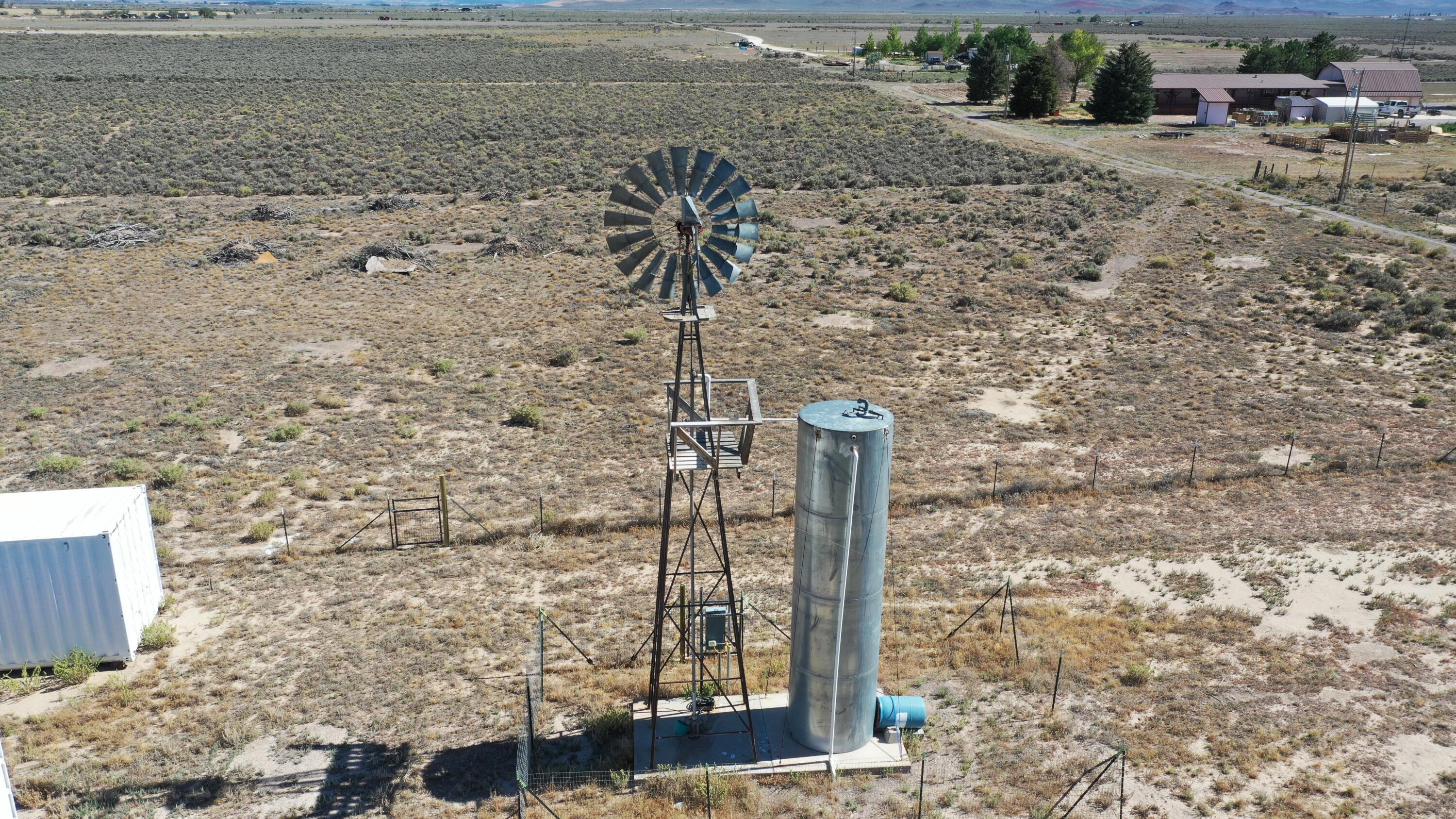 Discover the freedom and potential of Southern Utah living on this 10.21-acre property at 4610 N. 2650 W., Beryl, Utah. This usable parcel comes equipped with a well, pump, windmill, power on the property, and a pond that holds water. Three 40-foot Connex shipping containers with custom access doors provide exceptional storage, workshop, or operational space. Included are 2 acre-feet of valuable water rights with a strong 1944 priority date, adding significant long-term value and flexibility for agricultural, recreational, or future residential use. Easy year-round access makes this property ready to enjoy from day one. Water rights with older priority dates are highly sought after in the Beryl-Enterprise Valley and can be a significant asset for landowners.  

Located in the scenic Beryl-Enterprise Valley, this property offers wide-open spaces, panoramic mountain views, dark night skies, and a rich agricultural heritage. The valley has long been known for farming, ranching, and self-sufficient country living, with Enterprise just a short drive away for groceries, schools, dining, and community events. Sitting at over 5,000 feet in elevation, the area enjoys four distinct seasons, cooler summer temperatures than St. George, and access to thousands of acres of public land for ATV riding, horseback riding, hunting, and outdoor recreation. Whether you're looking for a homestead, recreational retreat, agricultural operation, or long-term investment, this property offers the space, water, and infrastructure to make your vision a reality.