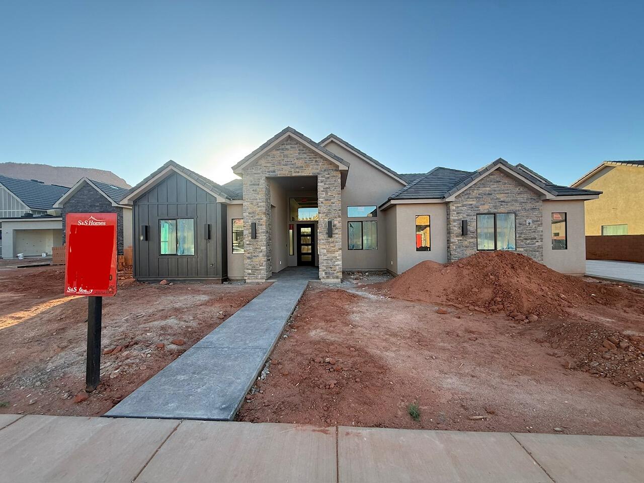 Gorgeous gable-style home: Large lot, giant slider in the great room, , casita, Red Mountain view, epoxy garage floor, wired for surround in the great room, and a 41.7 ft deep RV garage with RV parking on the side. The floor plan is open and light. The finishes are high-quality and beautiful: stunning iron door, combo of painted and knotty alder cabinets, gorgeous countertops, GE CAFE appliances, and Delta plumbing fixtures. Close to hiking and biking trails.