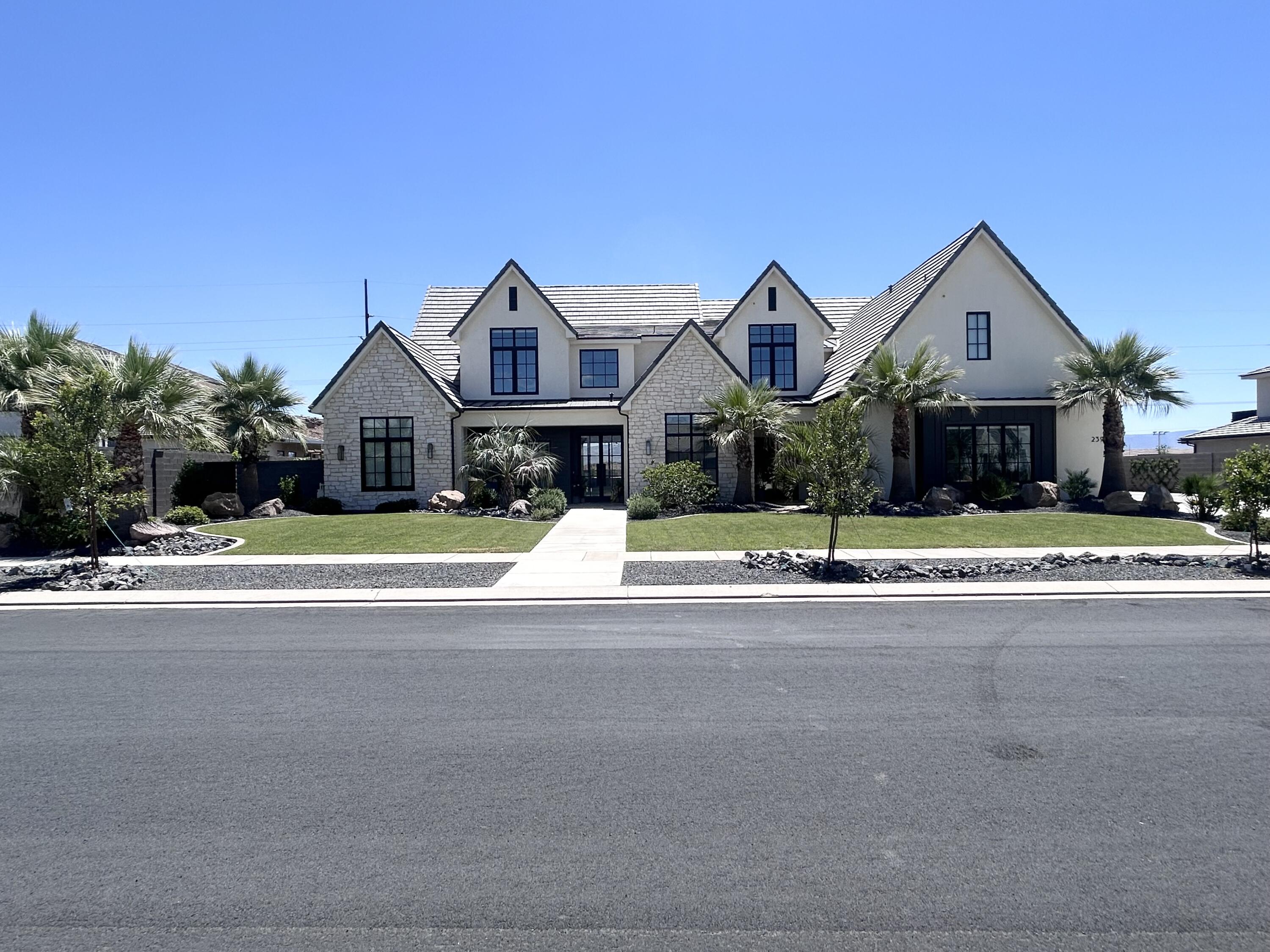 Experience Luxury Living in this 5600+ SQFT custom built home built in 2023. Experience the breath taking views with no backyard neighbors. Designed with comfort and entertainment in mind. This exceptional property features 5 bedrooms 5.5 baths including 3 private full suites. 
The gourmet kitchen is packed with premium upgrades including 2 dishwashers a huge walk in pantry, Drinking fountain, Hide a hose central vac and many other high end features through the home. 
The home also features a custom gas fireplace, Upgraded windows 3 Sliding glass doors, Built in speakers and wired security cameras.
The spacious layout offers a home gym, upstairs Kitchenette, 3 separate laundry areas including one in the master closet. The home was built with efficiency in mind featuring a tankless water heater, 2 separate EV Charging areas in the garage, 3 HVAC Systems that run on duel fuel. Park your 4 full size vehicles on the georgous Epoxy flooring with room to spare. 
Step outside to your own private resort style backyard featuring a pool, Hot tub, Putting green, full size Pickleball court and lighting system for those dark evenings, in ground trampoline, also grow your own produce in your amazing garden beds.Owner/Agent.