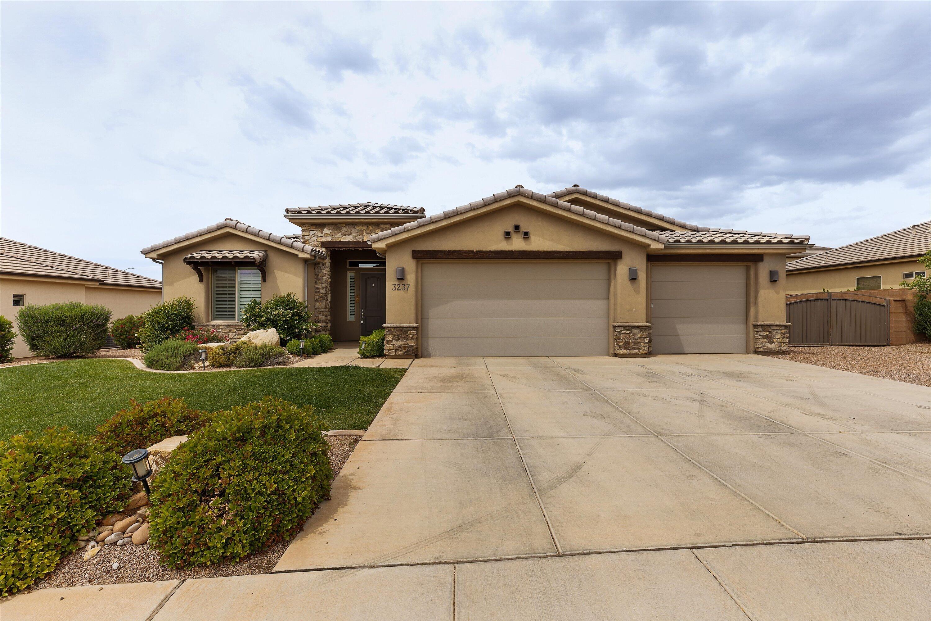 Welcome to your next favorite place to call home! This four bedroom, two bathroom house sits in one of St. George's most sought after neighborhoods. Crimson Ridge offers stunning red rock views and easy access to hiking trails, golf courses, and all the outdoor fun southern Utah is known for. 10' openings, water softener, plantation shutters, gas range, RV parking, and no HOA. The spacious layout gives everyone room to breathe, and the primary bedroom is a solid retreat after a day of desert adventures. Come take a look!