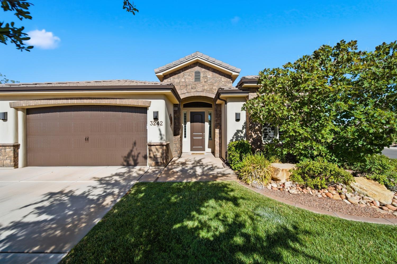 Welcome to this beautifully maintained 4-bedroom home situated on a desirable corner lot in one of St. George's most sought-after locations within the exclusive Crimson Cliffs school district. Even more rare, this property has NO HOA.

Freshly painted and thoughtfully designed, this home offers an ideal split floor plan with the spacious primary suite privately located on the opposite side of the home from the additional three bedrooms.

The inviting foyer features an extended recessed ceiling accented by an upgraded designer pendant light, creating an elegant first impression. The kitchen is both functional and stylish with upgraded cherry cabinetry, granite countertops, and a generous pantry for additional storage.

Step outside to an entertainer's backyard complete with a covered patio, hot tub on a dedicated pad, storage shed, and a built-in basketball hoop with a concrete play area--perfect for recreation and enjoying Southern Utah's beautiful weather.

The oversized garage includes durable epoxy flooring and overhead storage shelving, providing excellent organization and additional space.

This is a rare opportunity to own a well-appointed home in a prime location close to schools, parks, trails, shopping, and everything St. George has to offer. Homes in this area with no HOA are hard to find, making this property an exceptional value.