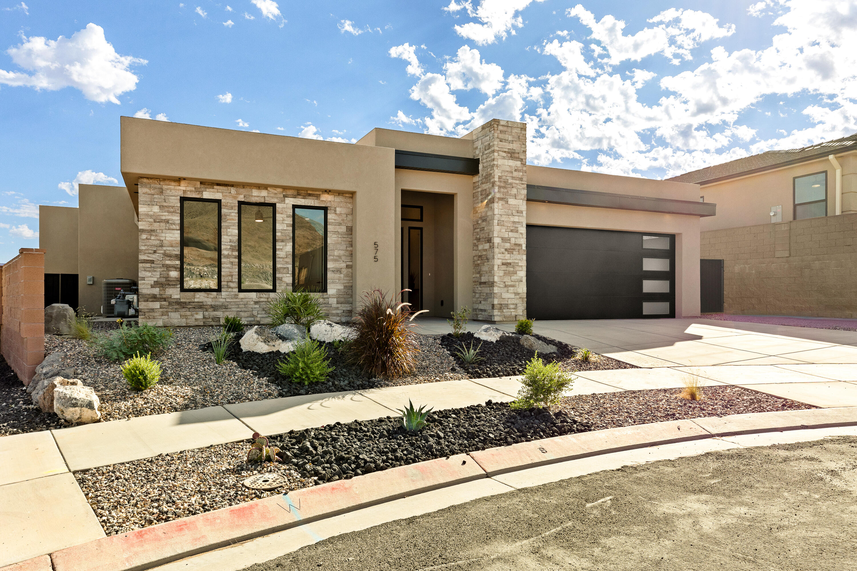 Discover your dream home in the desirable Ridge at Zion Vista, where the views of the Hurricane Valley serve as the picture perfect backdrop for the modern, elevated new home waiting for you. Upgraded appliances in a gourmet kitchen and an open concept floorplan for your entertaining needs. Spacious casita with a kitchenette and private entrance give your guests a true home away from home. The owner's suite includes a garden tub and large closet making your home feel like a luxury spa. Don't miss your chance to tour this beautifully finished model home! The seller is willing to sell the furniture inside the home for $25,000 (an over 50% discount).