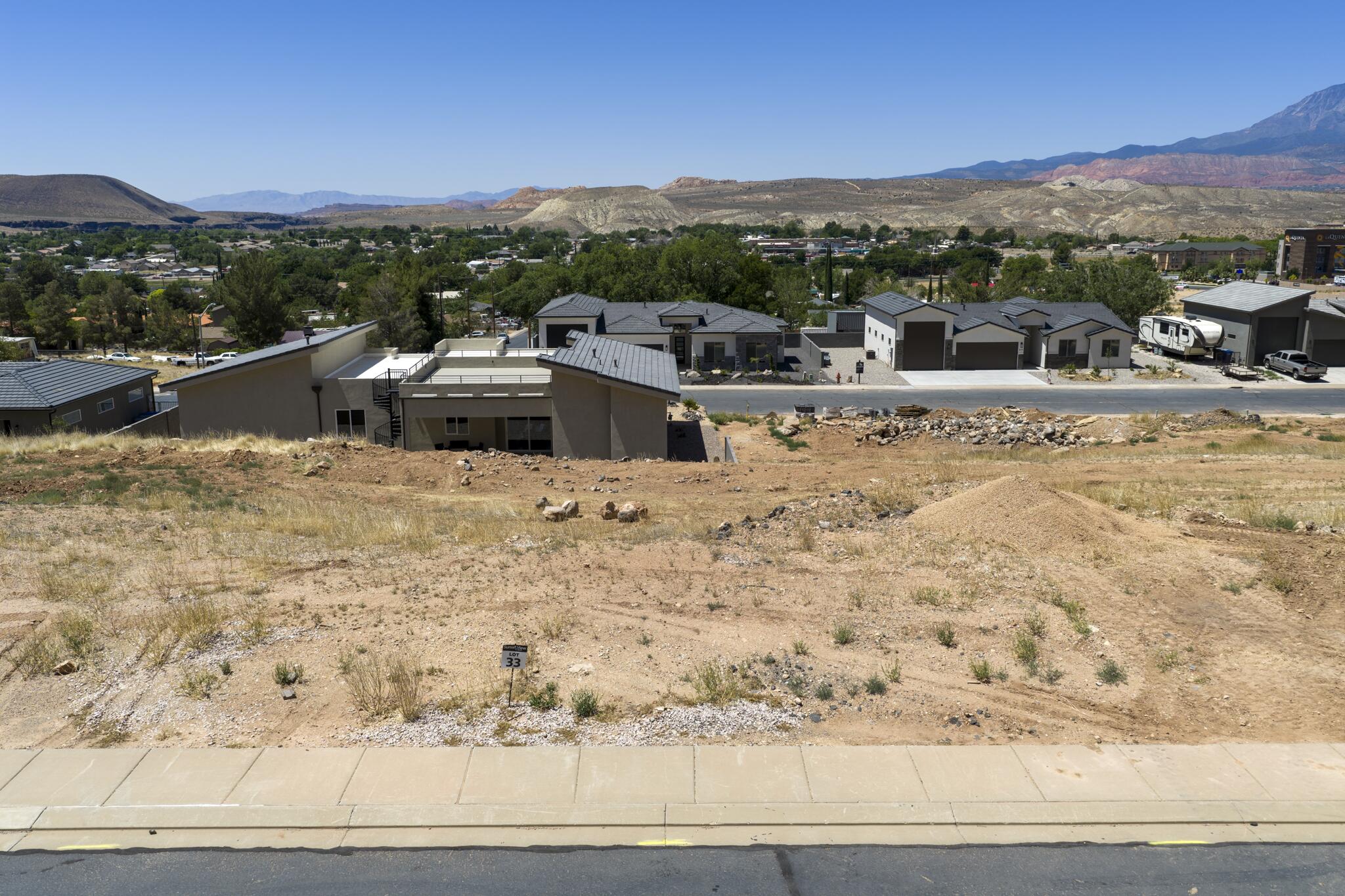 Conveniently located in La Verkin just minutes from Zion National Park, this .23 acre lot has walk-out basement potential. Providing the perfect opportunity to build in Southern Utah without the burden of HOA fees, this affordable building lot has a lot to offer. Tucked into a relaxed neighborhood, you will enjoy sweeping views of the valley and surrounding red rock mesas without paying premium resort prices.