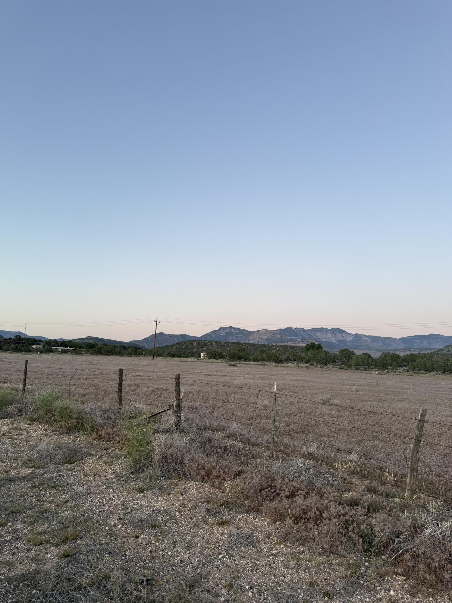 Make this property in Veyo your new home. Farm animals welcome. Higher elevation compared to St George makes for cooler summer days and darker starry night skies. The property fronts onto an asphalt county road with all utilities available except sewer. Includes culinary and irrigation water shares.1 share Veyo Culinary, 1 3/4 shares Veyo Irrigation water, 2 2/3 Veyo irrigation (Baker)