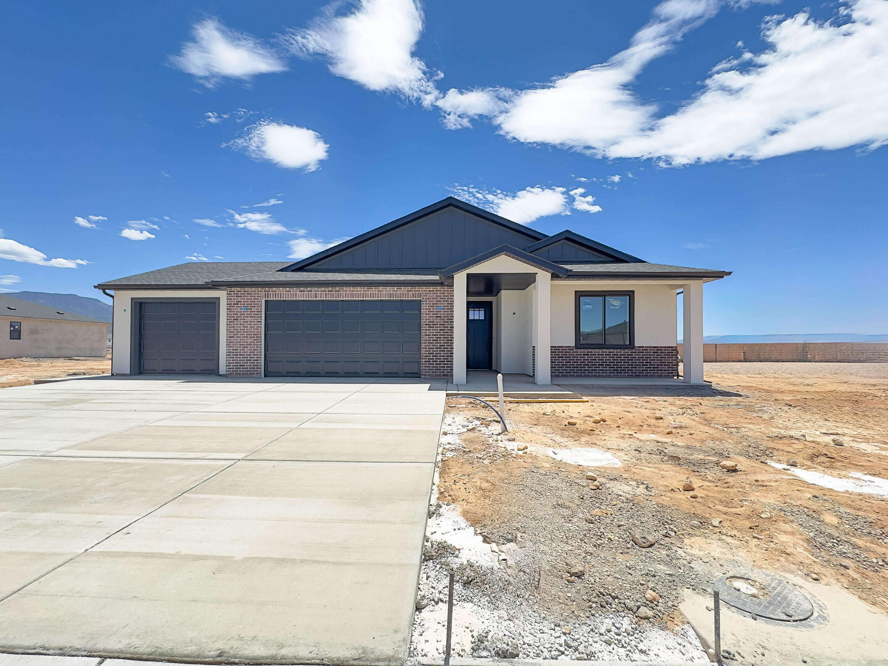 Brand-new single-level living in Cedar City's Iron West community! This 1,802 sq ft home offers 3 beds, 2 baths, and a 3-car garage! The open kitchen, dining, and family room flow together around a cozy gas fireplace, with doors leading to a covered patio for easy indoor-outdoor living. The primary suite features a walk-in closet and private ensuite. Energy-efficient 2x6 construction, R-49 attic insulation, and low-E windows keep utility bills low. Durable brick, stucco, and board & batten exterior means low maintenance for years to come. Perfect for empty nesters wanting to simplify or first-time buyers ready for a low-upkeep, move-in-ready home. Special Financing incentives are offered! Schedule your tour today!