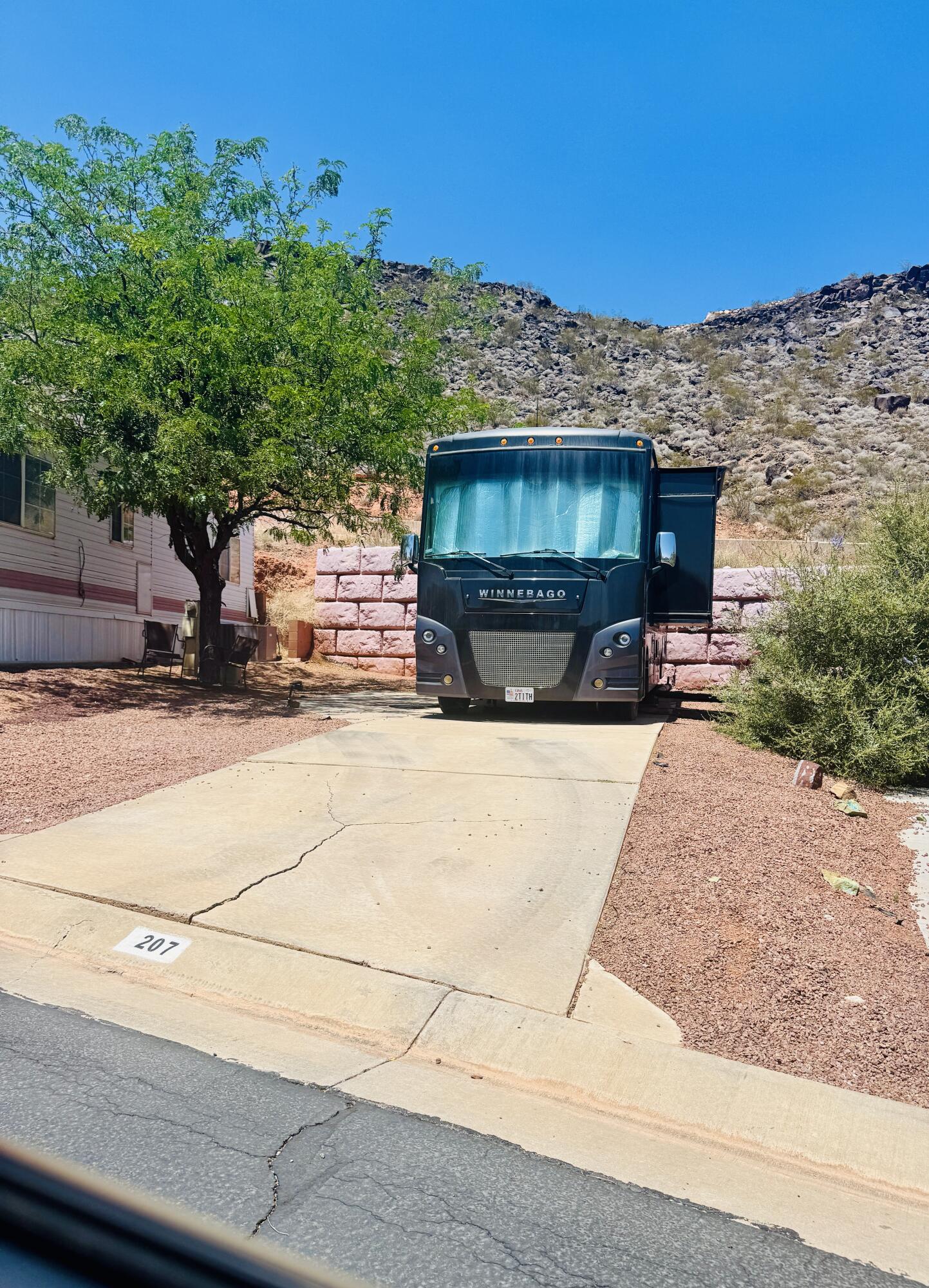 Enjoy this beautiful lot featuring a lovely privacy wall and a mature shade tree, creating the perfect outdoor retreat. Located in a desirable 55+ community, residents enjoy exceptional amenities including a pool, hot tub, clubhouse, fitness center, and more. A wonderful opportunity to relax and enjoy resort-style living! Buyer to verify all information.