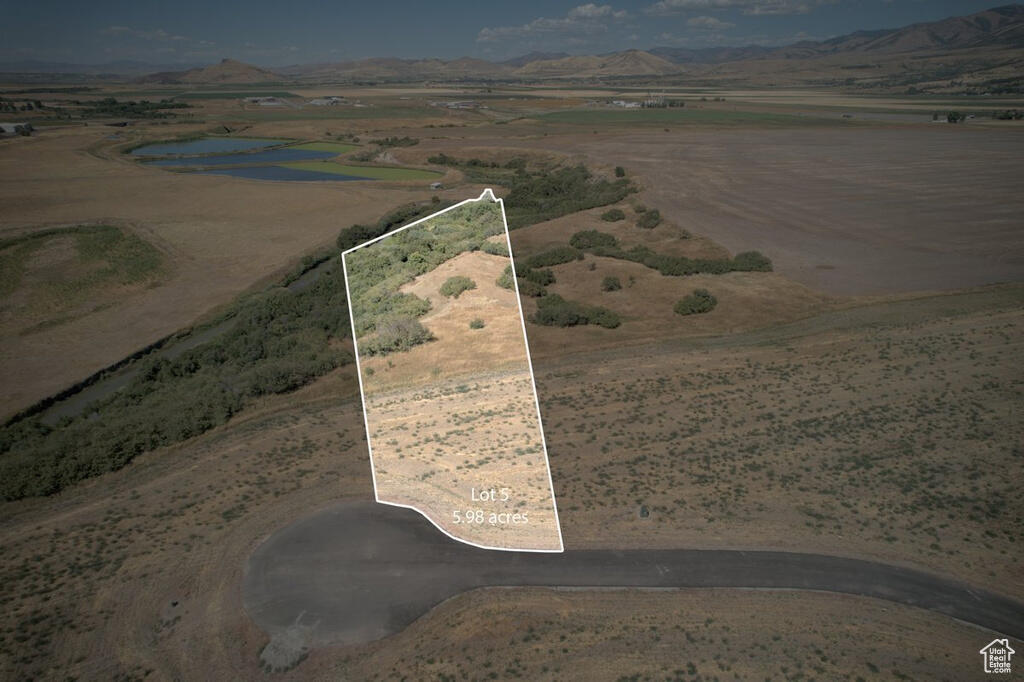 Welcome to Cub River Estates where you have room to breathe. This 5.91 acre lot offers 700 feet of Cub River frontage, rolling terrain and privacy. With secondary water it is ideal for a custom home, shop or recreational retreat just 15 minutes from Cherry Peak.