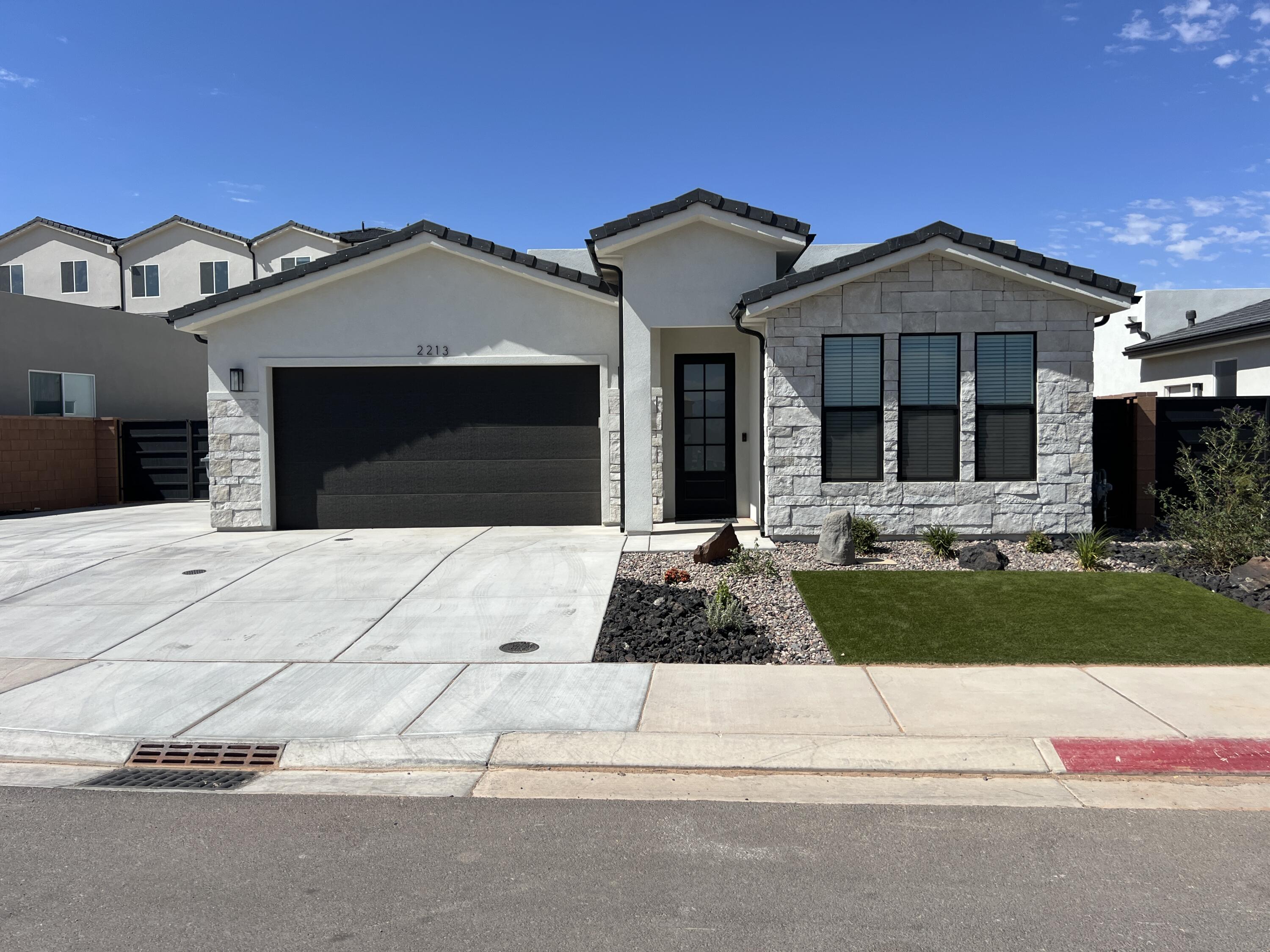 2213 W 320 S -A

This stunning 3-bedroom, 2-bathroom home offers 1,489 sq ft of thoughtfully designed living space with high-end finishes throughout. From the moment you walk in, you will notice the beautiful flooring, abundant natural light, and modern touches that make this home both comfortable and stylish.

The kitchen is a standout feature, offering plenty of space for cooking and entertaining. It includes modern countertops, a large corner pantry, and an open layout that flows seamlessly into the living roomperfect for gatherings or relaxing evenings at home.

The primary suite is generously sized and features a well-appointed bathroom with a double vanity and a walk-in shower equipped with dual shower heads. Ceiling fans are installed throughout the home to enhance comfort year-round.

Additional features include a 2-car garage and a functional layout designed for everyday living.

Please note: This property has an attached casita that will be rented out separately. The casita will not be a part of this lease and this property is priced accordingly. The backyard and a portion of the driveway (to the left of the garage when facing the home) are shared spaces.

This home offers a great combination of style, space, and convenienceideal for anyone looking for modern living in a well-designed home.

OTHER COSTS:
Tenants $200/ monthly for utilities
$13 /month emergency service fee
$100 /month pet rent
$500 pet deposit - $400 refundable
One time $35 application fee for prospects 18+