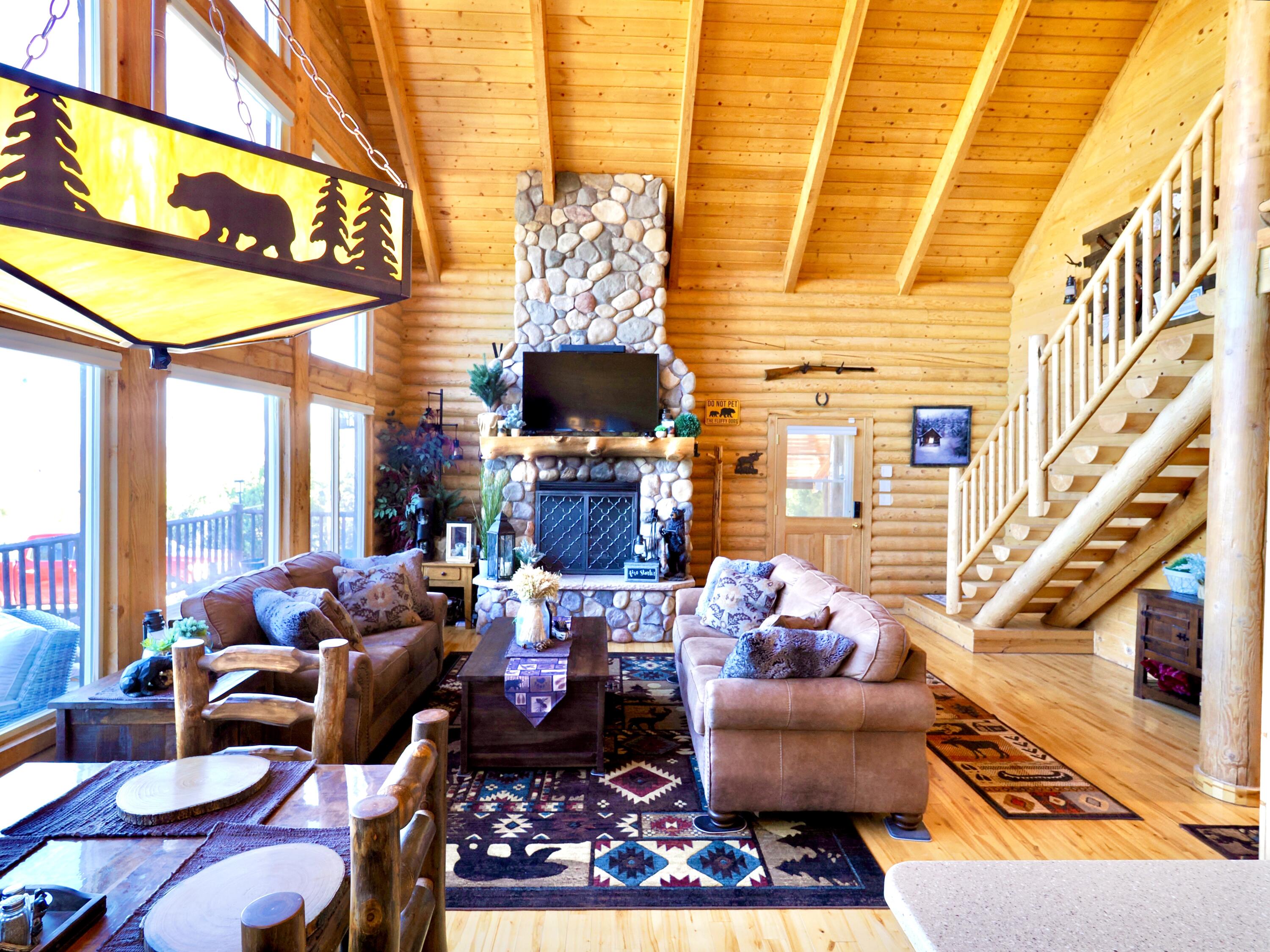 Escape the hustle and bustle in this darling log cabin nestled in the trees. Enjoy breathtaking mountain views and year-round access across all four seasons. This extraordinary, turn-key retreat near Brian Head Ski Resort offers quiet serenity, outdoor adventure, and consistent income potential. *Highlights: 1.Adventure: Ski Brian Head in winter or spend summer afternoons on the numerous ATV trails right outside your door. 2. Serenity: Relax with stunning sunrises and sunsets from your deck. 3. Off-Grid: Owned solar (2022) and private water rights. 4. Ready for You: Sold fully furnished. This mountain escape is ready for your immediate enjoyment. It's also perfectly set up for short-term vacation rental or serve as a consistent long-term rental investment. Schedule a showing today.