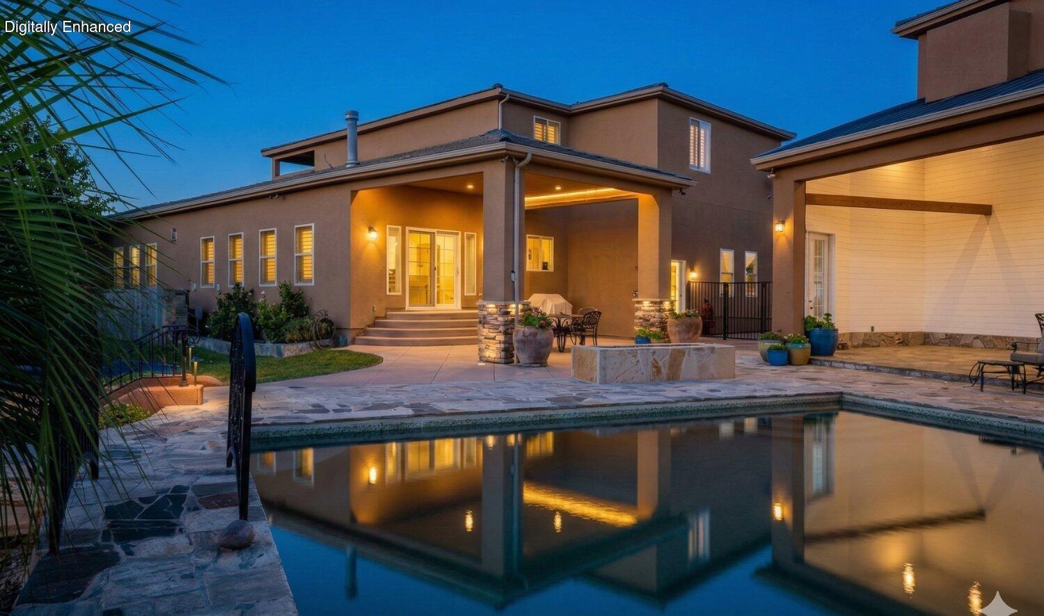 Welcome to this extraordinary home that absolutely needs to be experienced, not just viewed! The home boasts a wide range of impressive features that set it apart from the rest. This 3.43 acre equestrian property is zoned for keeping up to eight horses, making it an ideal sanctuary for both humans and their equine companions. Situated two-feet higher than its neighboring properties, this estate exudes an exceptional sense of grandeur and prominence with river access for the avid ATV rider.

The HUGE detached RV garage was designed to accommodate two class A motorhomes, ensuring ample space and convenience for all your outdoor adventuring needs.  Furthermore, the garage is outfitted with hot water supply, for RV hook up, car washing or a variety of tasks. Plus, above the garage there is a beautiful, fully equipped dance studio with a gorgeous full bathroom and several mini-split systems for heating and cooling.

The yard is an absolute sanctuary with gardens, orchards, and an oversized 50,000-gallon all-natural pool, reaching a depth of 14 feet. This stunning oasis of relaxation and entertainment promises a refreshing escape from the outside world. Enhancing the outdoors, this property offers not one, but two outdoor showers, a sunken fire-pit with seating gathering under the stars and a gas fire pit for ambiance. An incredible cabana with a loft offers escape from the sun poolside.  All this provides for a truly unique and rejuvenating experience amidst nature's beauty.

Entertainment takes center stage in this home, which features a remarkable 4K theater room that provides a cinematic experience within the comfort of your own home. Complementing this, there is also a dedicated music studio with double sound board walls, catering to those with a passion for creating and producing music or any audio-related ventures.

Safety and security were also in mind during the design phase and a major highlight of this property is the inclusion of French drains, guaranteeing efficient drainage and preventing any potential water damage.. Built with flood control measures in mind, this home is equipped with flood retaining capabilities to ensure maximum protection and peace of mind during inclement weather conditions. The thoughtfully designed basement includes windows with emergency stairs, allowing for easy and safe exit strategies in case of any unforeseen circumstances.

This incredible home promises a lifestyle filled with luxury, convenience, and limitless possibilities. Don't miss the opportunity to make this extraordinary property your own.