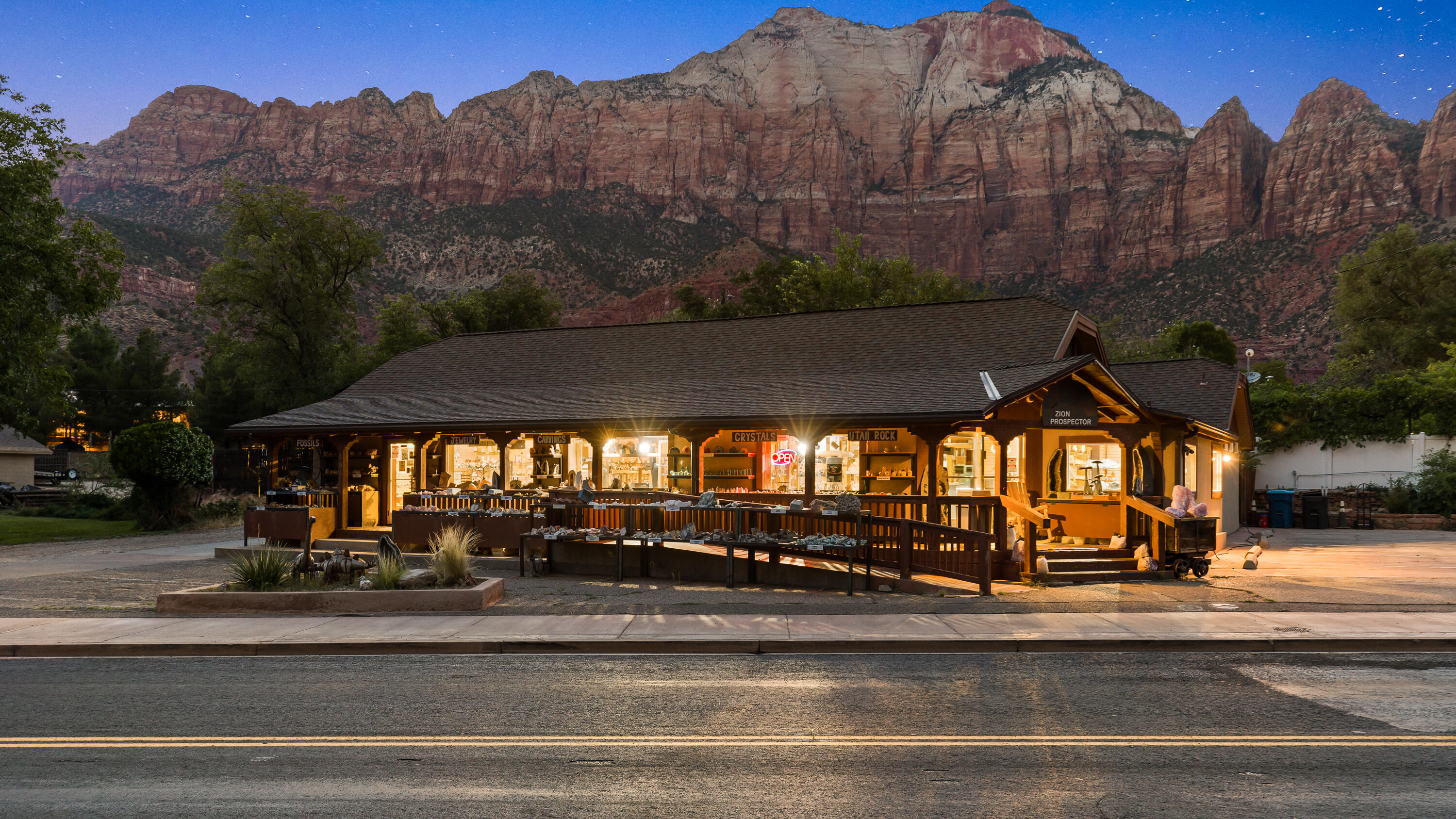 Discover a rare chance to build your life and your business at the gateway to Zion National Park. For over 20 years, this profitable and beloved rock shop has welcomed visitors from around the world, offering unbeatable frontage, high visibility, and the freedom to live steps from your work in vibrant Springdale. You'll enjoy 1,719 square feet of commercial space with good, strong financials, plus a spacious 1,646-square-foot apartment featuring 3 bedrooms and 2 baths—perfect for an owner, staff, or rental income. Additional perks include a 60-square-foot storage basement and a 0.30-acre lot with on-site parking.

Millions of visitors pass by this location each year, making it a prime setting to continue the rock shop legacy or introduce your own vision. The current manager is willing to stay, offering continuity. There is also an opportunity to elevate the business through expanded social media and marketing.

Imagine waking up every day to the red cliffs of Zion glowing outside your window. If you're ready for a new chapterone fueled by beauty, tourism, and endless potentialthis is your moment.