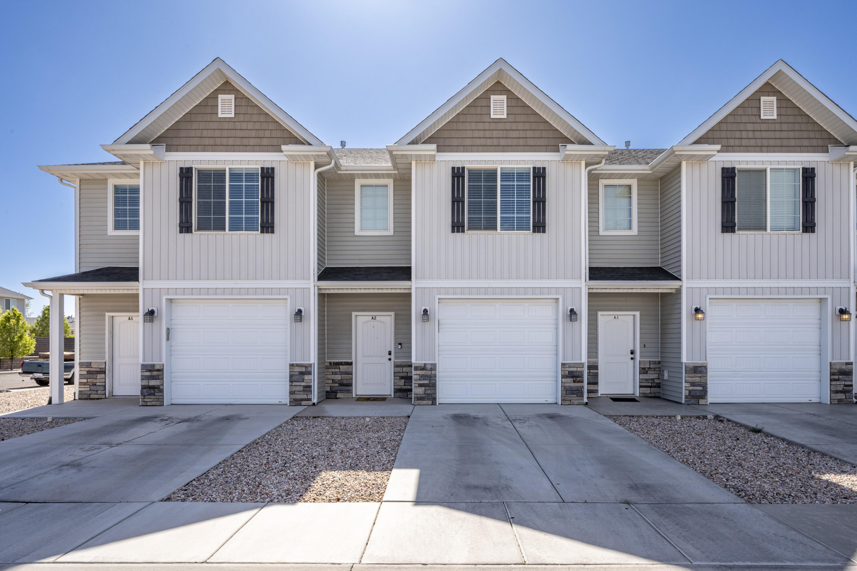 Welcome to this beautifully maintained townhome located in The Fields Townhome Subdivision! Offering 1,544 sq ft of comfortable living space, this 3 bedroom, 2.5 bathroom home features an attached one-car garage and a functional, open-concept layout perfect for everyday living. The main level offers a spacious living area that flows seamlessly into the kitchen and dining space, along with a conveniently located half bath for guests. Upstairs, you'll find all three bedrooms, a dedicated laundry room, and a spacious primary suite complete with a large walk-in closet, relaxing soaking tub, and separate shower. Step outside to enjoy the fully fenced backyard and patio area--perfect for BBQs, pets, or simply relaxing outdoors--with low-maintenance xeriscape landscaping. 
Conveniently located in Cedar City near parks, shopping, and other local amenities, this townhome offers comfort, convenience, and easy living all in one!