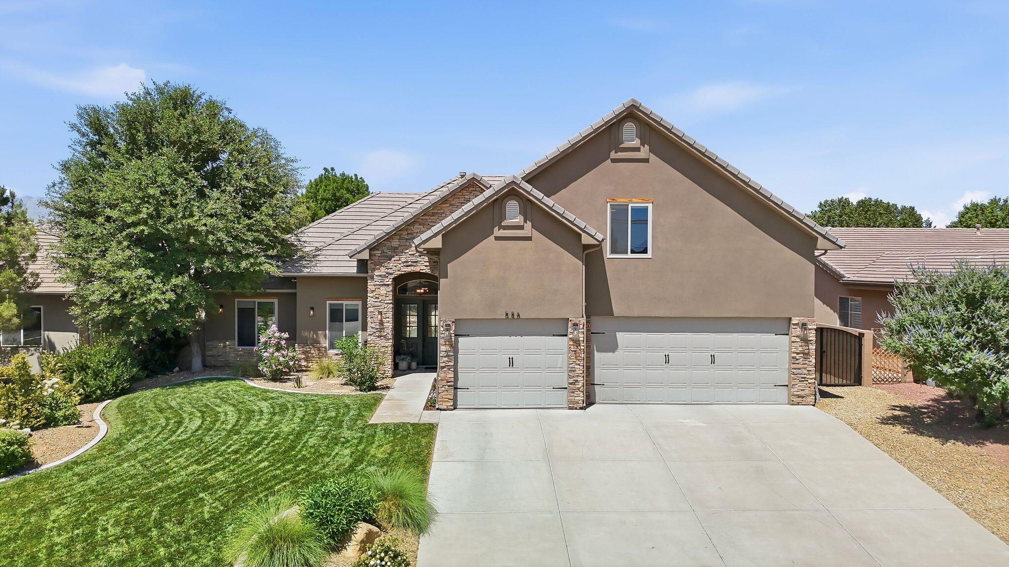Welcome to this stunning two-level home located in the highly desirable Highlands at Green Valley subdivision. Fully remodeled and impeccably maintained, this home showcases quality upgrades and exceptional attention to detail throughout.

From the moment you arrive, you'll be impressed by the beautiful French front doors, fresh paint, new windows, and updated flooring that create a bright and inviting atmosphere. The gourmet kitchen is a chef's dream, featuring stainless steel appliances, granite countertops, and a premium gas stove with four burners and a built-in griddle.

The oversized primary suite offers a private retreat with French doors leading directly to the backyard. The luxurious primary bathroom includes a double vanity, jetted soaking tub, walk-in tile shower, and an oversized walk-in closet.

Upstairs, you'll find a private bedroom with its own en-suite bathroom, along with a spacious family room--perfect for a play area, media room, or additional gathering space.

Step outside to enjoy the fully fenced backyard complete with mature landscaping, a covered patio, and a cozy gas fire pit--ideal for entertaining or relaxing year-round.

Additional upgrades and features include double water heaters, an epoxy-coated garage floor, and a reverse osmosis (R/O) water system.

This exceptional home combines comfort, style, and functionality in one of the area's most sought-after neighborhoods.