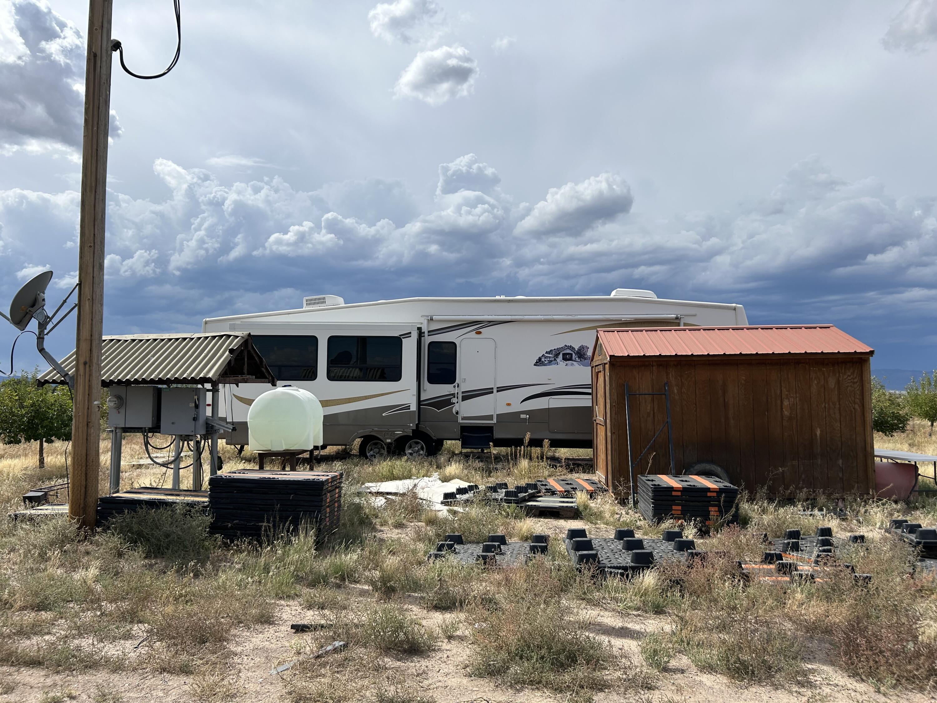 This is 19.6 acres with an apple orchard, over 200 trees. The property comes with 2 acre feet of water rights, a well, and drip system for watering the trees. The RV Trailer is included. There is a storage shed on the property and full electric hookup. There are a total of 2 lots that can be subdivided. The zoning is R1. The property has easy year round county road access. No CCR's or HOA. Located on county road in Escalante Valley Ranchos just off of Hwy 56. Don't delay come see today! Use the following Google Maps link to find the property: https://maps.app.goo.gl/VwW5WURKXD46H4277
