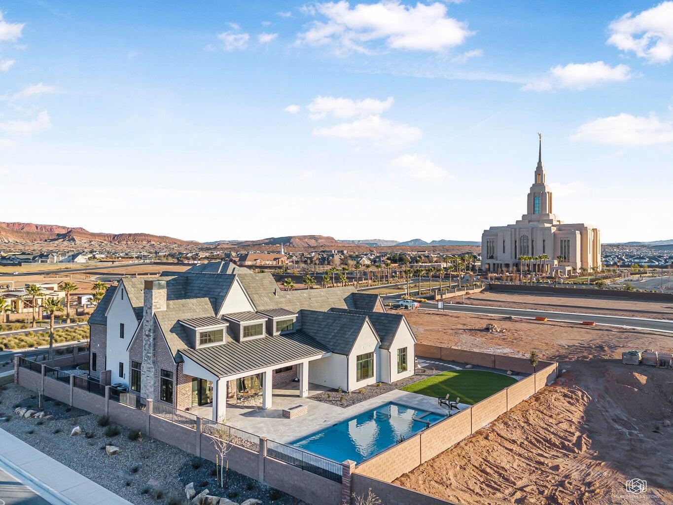 Discover unparalleled luxury in this brand new, custom-built home. Featuring 5 bedrooms and 5.5 bathrooms, this residence is designed with exquisite attention to detail and high-end finishes throughout. Enjoy the tranquility of a beautifully landscaped yard and relax by the pristine pool, all while taking in breathtaking views. This home offers the perfect blend of elegance and comfort, making it an exceptional choice for those seeking a premium Southern Utah living experience. What's more, a premier lifestyle and retail center is coming soon just minutes from the Summit View Community, bringing top-tier dining, shopping, and energy to the area that will enhance both lifestyle and long-term value. Don't miss the opportunity to make this stunning property your own!