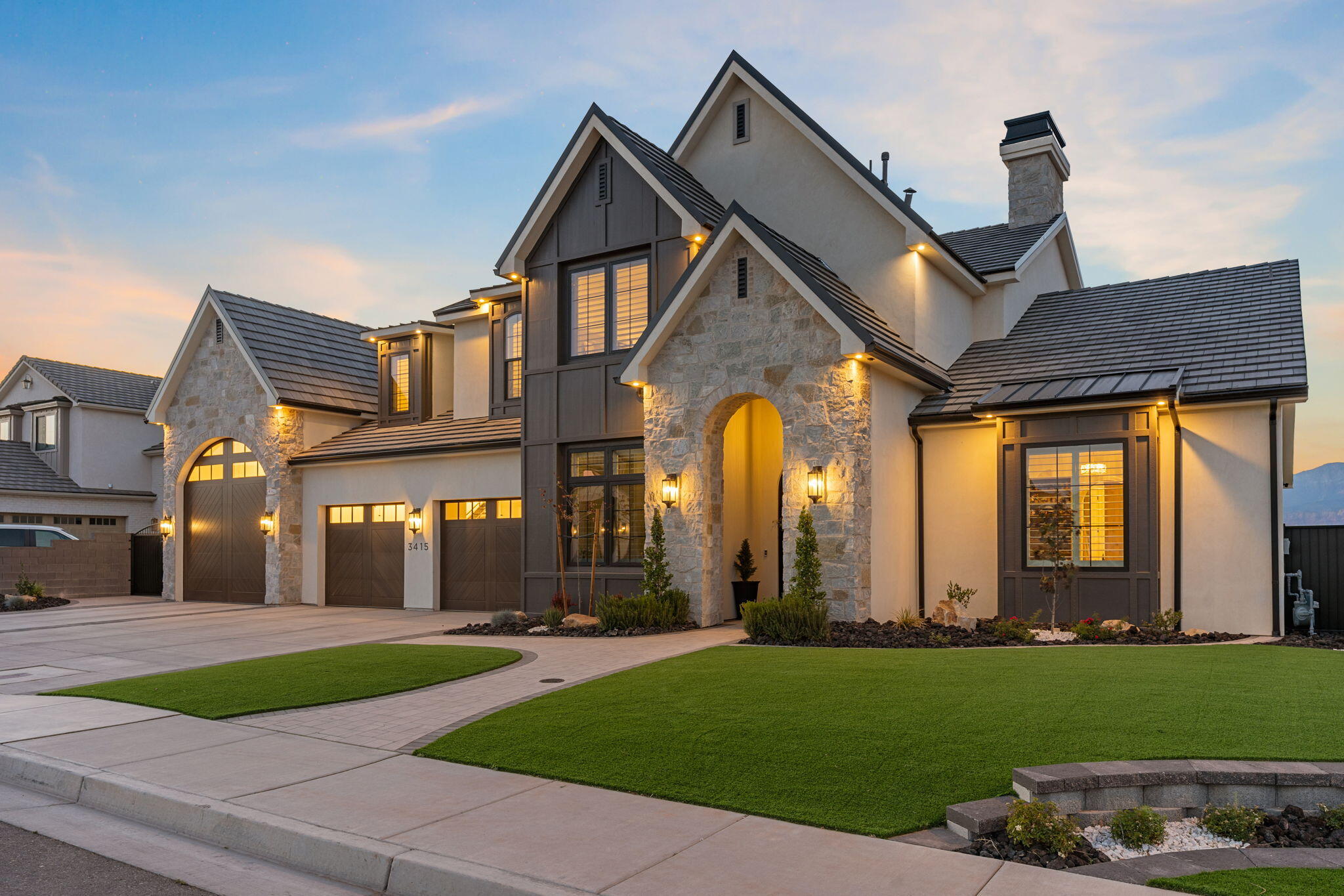 WEBB ACRES- Luxury living meets Family Friendly vibe in this stunning custom-built home by J.W. West Homes. 

Offering 5,200 sq ft, 6 bed, and 5.5 bath, this home was designed for seamless indoor/outdoor entertaining with natural light pouring through every space. 

Enjoy high-end features and designer finishes throughout, plus a resort-style pool complete with a dive platform, landscape waterfall feature, putting green, pickleball/basketball court, and expansive outdoor living areas. 

Thoughtfully designed for both everyday comfort and elevated entertaining, the main level welcomes you with an open living room filled with natural light, large retractable slider door, a chef-inspired kitchen, spacious dining area, butler's pantry, and stylish wine/bar station. The private primary suite offers a true retreat with a spa-like bath and oversized custom closet, while an office or guest room adds flexibility for home office or guests. A main-level oversized laundry room adds everyday convenience.

Upstairs, the home continues to impress with a spacious second family room opening to a walk-out deck with room to relax and take in the views. You'll also find a dedicated gym room, cozy reading nook, and four additional bedrooms--two featuring private en-suite baths. A second laundry room upstairs makes daily living effortless.

The oversized RV garage with bonus storage room above adds both function and flexibility to this quality-built luxury retreat in one of St. George's most desirable neighborhoods. 

No HOA. Low Dixie Power utilities.