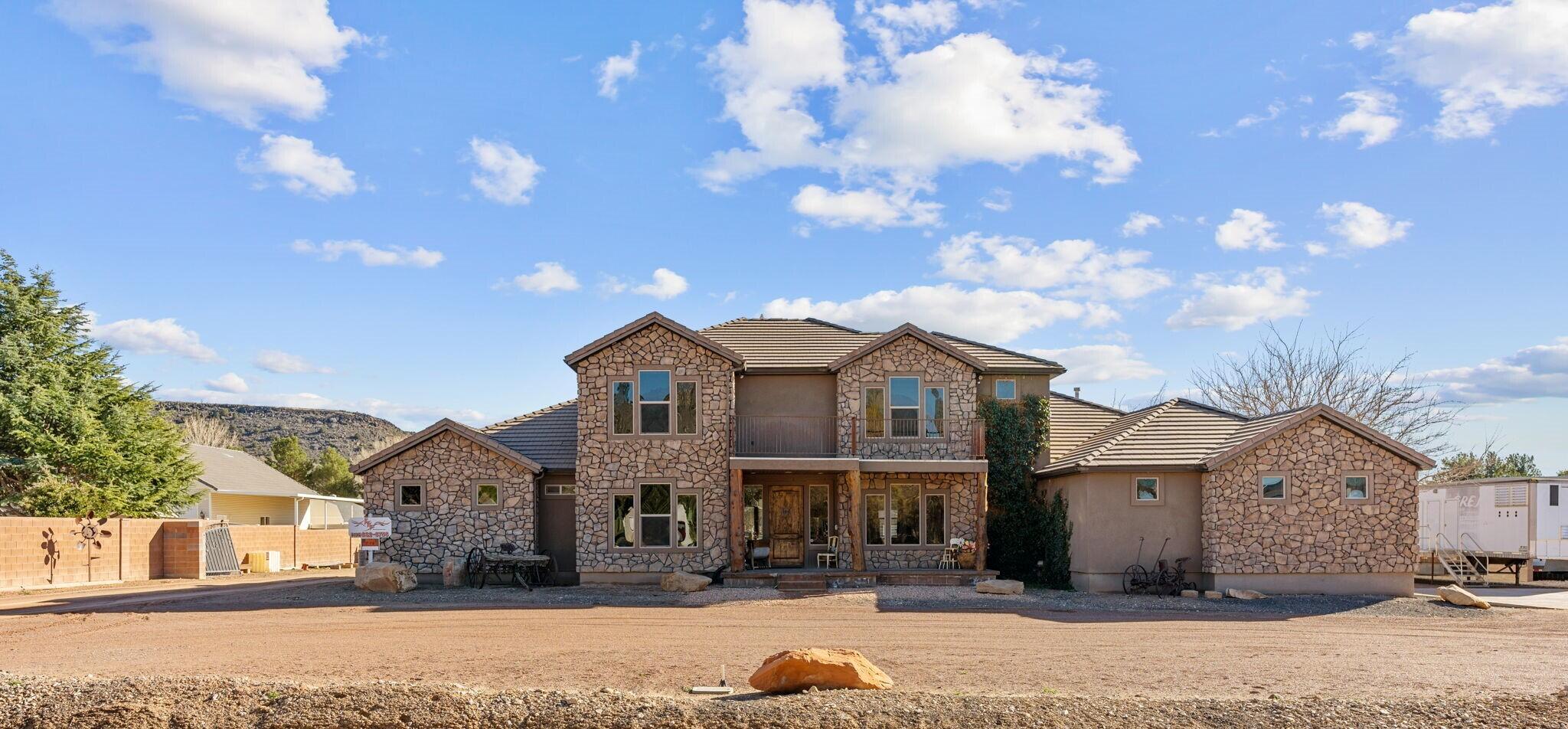 Stunning home in Diamond Valley. Amazing kitchen with room to entertain! Spacious rooms with walk-in closets. Upstairs living with front balcony. Theater room (could be a 5th bedroom). Spacious 3-car garage. Plus, huge shop with 1-bedroom apartment over--could potentially provide rental income. Horse property with mountain views all on 1.13 acres. There is even room for a basketball hoop, ATVs and your RV!