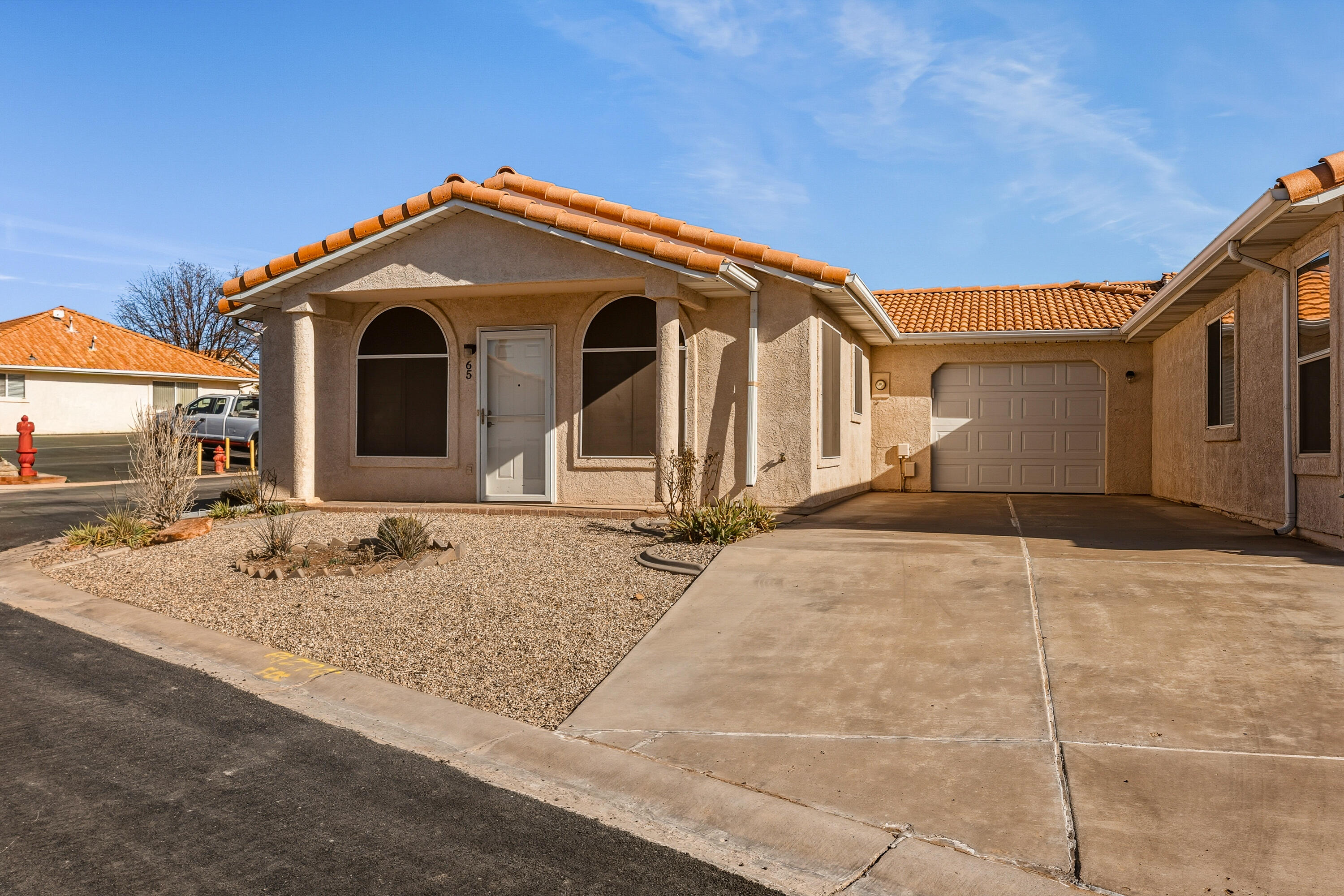 Move-in ready, one-level home in the desirable Horizons West 55+ community! Enjoy a bright open floor plan with a spacious kitchen, dining, and living area--perfect for everyday living and entertaining. Recent upgrades include flooring, lighting, A/C, furnace, and water heater (all less than 2 years old). Features also include plantation shutters, solar screens, and a low-maintenance yard. One-car garage includes storage shelving.