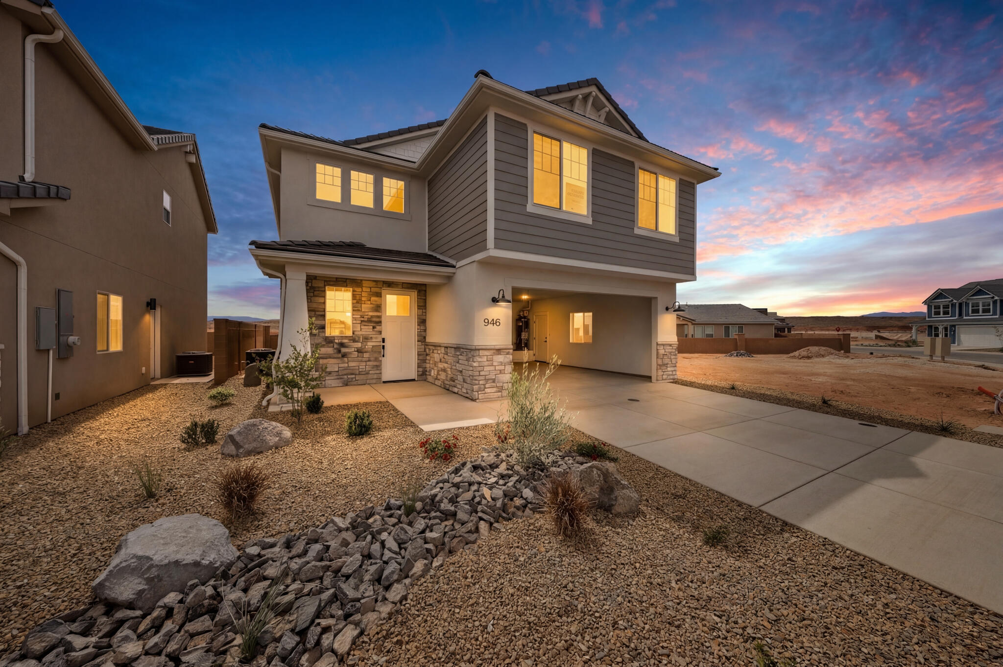 NO BACKYARD NEIGHBORS! Welcome to the Onyx! This inviting 3-bedroom, 2.5 bath home features and open floor plan, a versatile loft, and breathtaking views. Located in The Preserve at Alaia, a thriving community with easy access to outdoor recreation and Zion Shores!