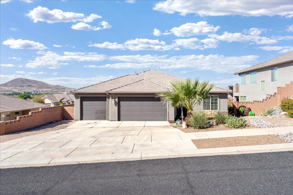 'back-up offers welcome' Immaculate home with wonderful permanent views of the Hurricane valley and surrounding hills & NO HOA!  Convenient split bedroom floorplan featuring upgrades such as 8' doors, 9 & 10' ceilings, tile flooring, granite counters, custom cabinetry, water softener, & aluminum patio cover.  Hurricane City provides unlimited irrigation water for $12 per month.  Used as a 2nd home with minimal wear and tear.  Taxes would be lower for primary residence.