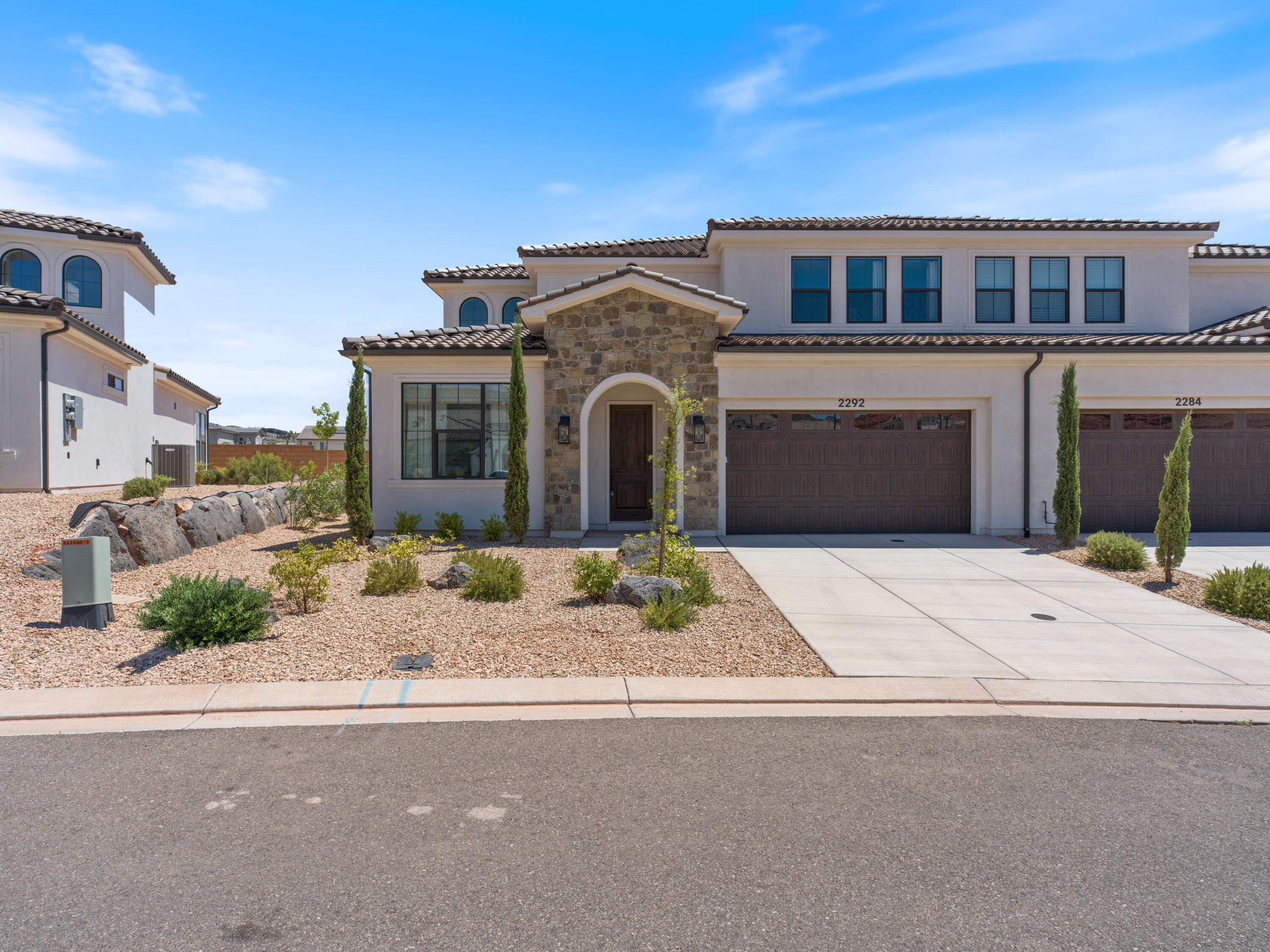 ZONED SHORT-TERM RENTAL- Back on market and improved price! Located in the new and highly desirable Sendera community in Washington, this 5 bedroom/5 bathroom home was the model home for the builder. It is upgraded to the highest level throughout. Each room is a mini-suite, with a private bathroom for each room- perfect for nightly rentals. Due to it being a model home, it has never been rented out. Situated in a prime location- directly across from the community pool and extra parking. This house is quiet and private while being less than 5 minutes from I-15. This is a rare opportunity to own a fully upgraded former model home in one of the most popular and sought-after communities for nightly rentals. Model furniture is not included and priced below market for quick sale.