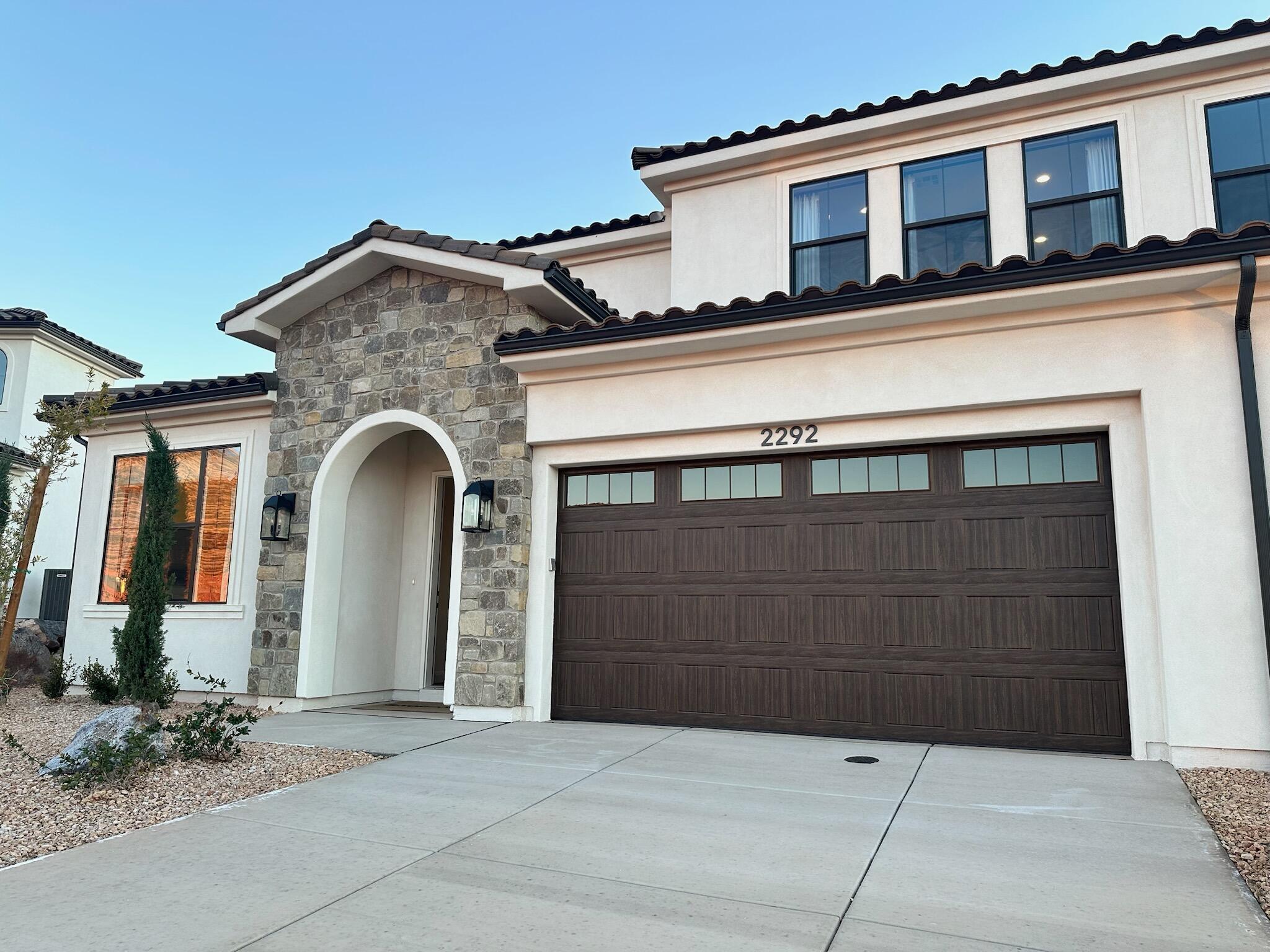 ZONED SHORT-TERM RENTAL- Back on market and improved price! Located in the new and highly desirable Sendera community in Washington, this 5 bedroom/5 bathroom home was the model home for the builder. It is upgraded to the highest level throughout. Each room is a mini-suite, with a private bathroom for each room- perfect for nightly rentals. Due to it being a model home, it has never been rented out. Situated in a prime location- directly across from the community pool and extra parking. This house is quiet and private while being less than 5 minutes from I-15. This is a rare opportunity to own a fully upgraded former model home in one of the most popular and sought-after communities for nightly rentals. Model furniture is not included and priced below market for quick sale.