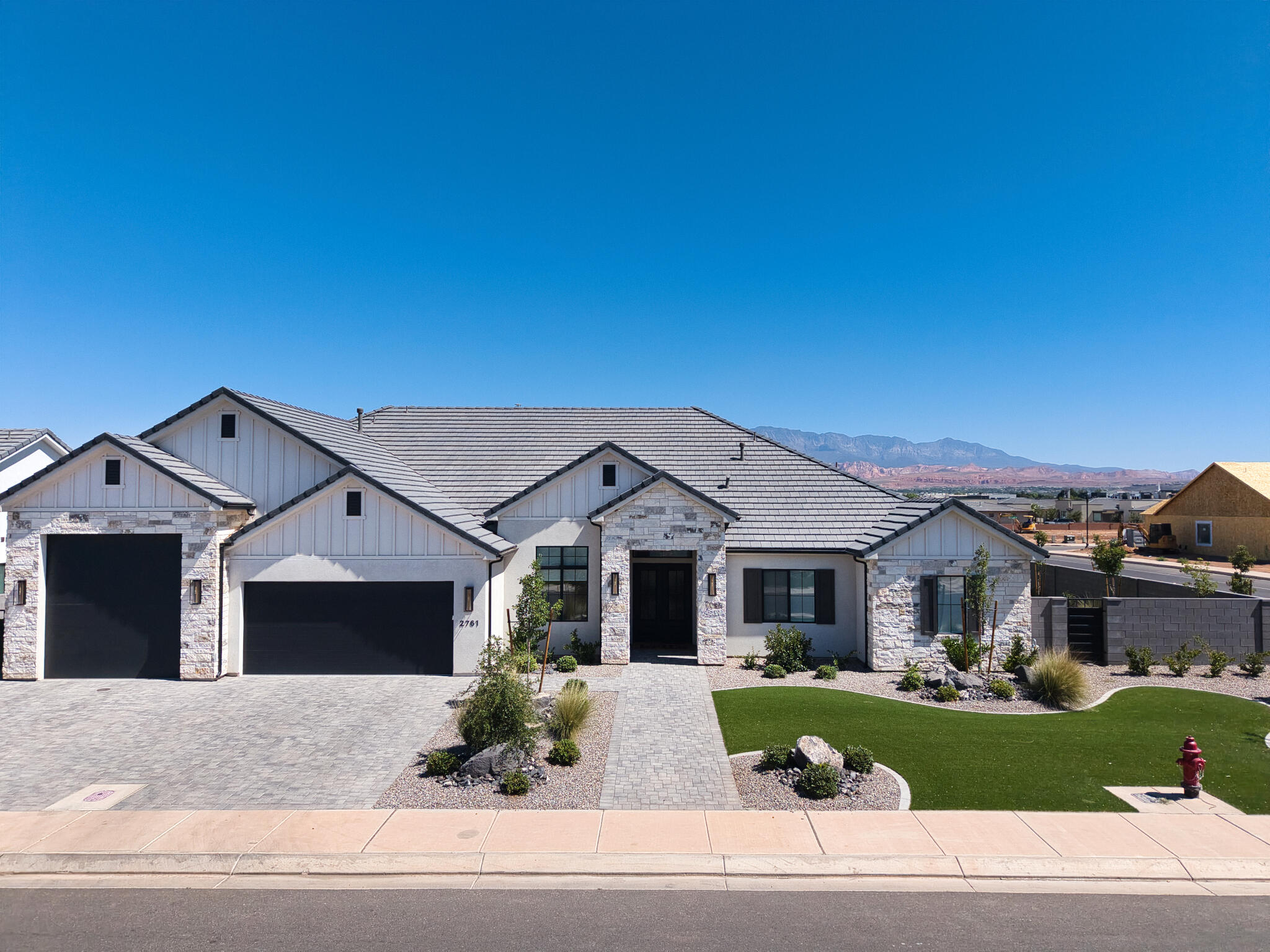 Beautiful single-level home in the highly sought-after Moorland Park neighborhood! Situated on a private corner lot, this exceptional home offers a bright, open floor plan with expansive picture windows and soaring 10'-13' ceilings that fill the home with natural light. Every bedroom features its own en suite bathroom, providing comfort and privacy for family and guests.
The spacious primary suite is a true retreat with a luxurious bathroom and custom walk-in closet. The gourmet kitchen is designed for both everyday living and entertaining, featuring a premium appliance package, built-in refrigerator and freezer, oversized walk-in pantry, custom cabinetry, quartz countertops, and designer finishes.
Quality craftsmanship is showcased throughout with rich hardwood flooring, stunning millwork, gorgeous tile work, and thoughtful upgrades at every turn. The RV garage features durable epoxy floors, while the beautifully landscaped backyard offers large artificial turf areas, elegant iron gates, a cozy fire pit, and a fun mini golf area. Additional highlights include a paver driveway and patio, creating exceptional curb appeal and outdoor living space.
This remarkable home combines luxury, style, and functionality in one of the area's most desirable neighborhoods.