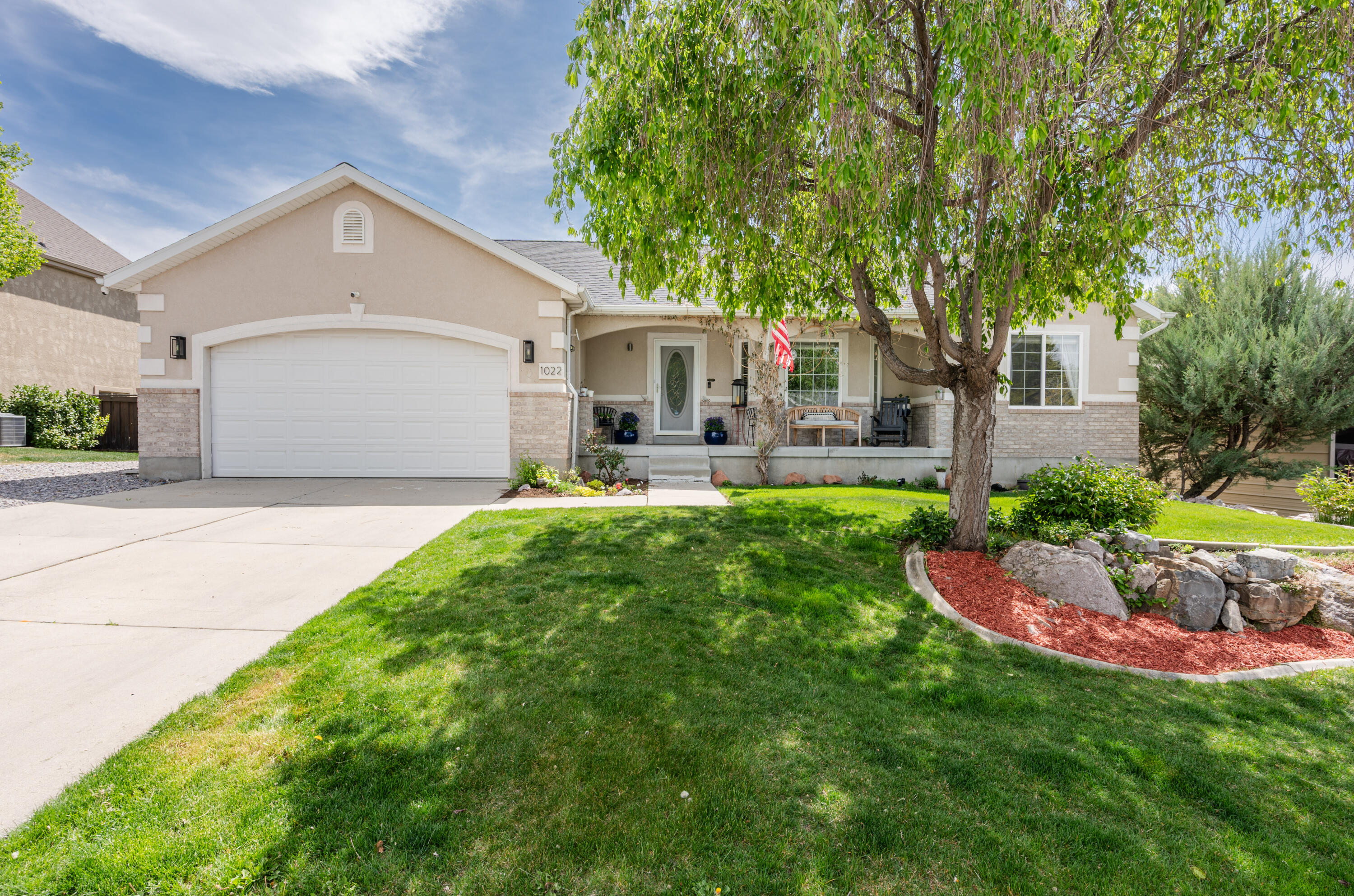 **PRICE REDUCED** Hurry! Back on Market!*AIRBNB-STYLE INCOME POTENTIAL!**Beautiful east bench rambler in Pleasant Grove offering flexible living with separate lower level that has a proven track record of Airbnb and rental income. (buyer to verify all local rental regulations & permitted use).  Located in a quiet, established neighborhood with quick access to Provo Canyon, hiking, biking, and nearby ski resorts, this home combines lifestyle, location, & opportunity.
Main level features an open layout, abundant natural light, a welcoming kitchen w/stainless steel appliances & comfortable living spaces. Primary suite includes a private bath, w/additional bedrooms providing flexibility for guests, office, or family needs. The kitchen appliances-including the refrigerator, stove, and dishwasher-have all been replaced within the past two years, and the roof is also just two years old.
The fully finished walkout basement includes a separate entrance & a full second kitchen w/updated cabinetry, creating an ideal setup for a mother-in-law apartment, Airbnb, or rental income opportunity. This lower level has been successfully utilized for short term rental use, offering privacy & separation from the main living space. Income documentation available upon request. Furnishings in the lower level Airbnb space are negotiable. The downstairs rental unit has its own dedicated parking area on the side of the home.
Outdoor living is a standout feature with mature landscaping, terraced garden beds, & a beautifully designed pergola covered dining area perfect for entertaining. The private backyard offers a peaceful retreat with space to relax, garden, and gather.
Additional features include a 2 car garage, ample parking, and a well maintained lot in a highly desirable east bench location.
Square footage figures are provided as a courtesy estimate. Buyer to verify all.