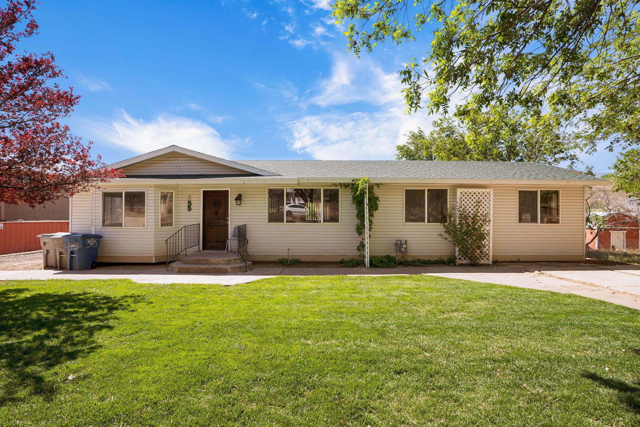 Completely remodeled and move-in ready, this 1,599 sq ft home in Toquerville offers 4 bedrooms and 2 bathrooms with amazing views front and back. The property features a brand-new HVAC system with newly converted central A/C, a new roof, and modern finishes that provide both comfort and peace of mind. Situated on a rare creekside lot, Ash Creek runs directly behind your backyard, creating a private, tranquil setting complemented by mature fruit trees. The outdoor space is further enhanced with paid irrigation, making landscaping both efficient and low maintenance. There's ample room for all your recreational needs with RV parking and hookups. Conveniently located just 2 minutes from I-15, this home provides quick access to some of Southern Utah's most sought-after destinations. You're approximately 25 minutes from Cedar Breaks, Zion National Park, Toquerville Falls, Sand Hollow, and the shopping, dining, and amenities of St. George. This property combines modern upgrades, natural beauty, and an unbeatable location--ideal for full-time living, a second home, or an investment opportunity. ''Information deemed reliable, however buyer to verify all information, including utilities, rental restrictions, and HOA information if applicable.''