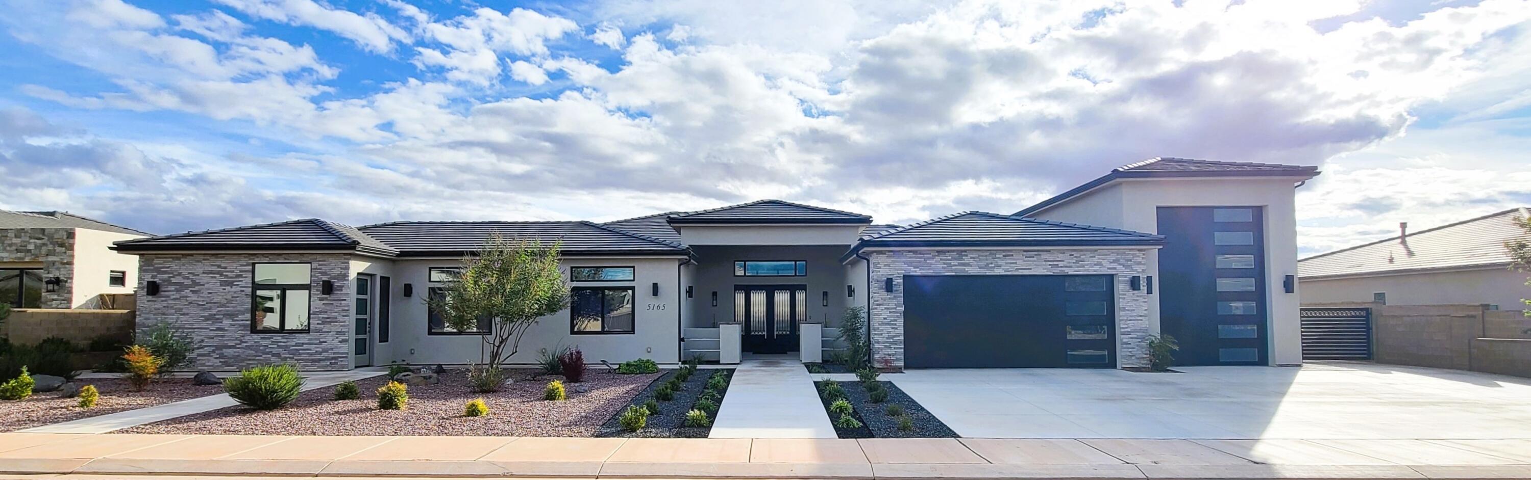 This beautiful custom-built single level home in Pecan Valley Estates. Minutes from Zion National Park, Sand Hollow State Park/Sand Dunes, Quail Lake, Sky Mountain/Sand Hollow golf courses, this property with NO HOA offers best in Southern Utah living. Built on a 0.34-acre lot with 25' setback, this house with an entry of a 14-foot ceiling captures a modern luxury living experience. Upgrades include flooring, two-tone paint, appliances, HVAC, gas fireplace, cabinets, lighting, and many more. The attached Casita offers a keypad private entry, large bedroom, full kitchen and laundry room. The backyard covered patio with private saltwater pool/spa and fire lit water feature is stunning. Oversized two-car and RV garage offers plenty of space for recreational vehicles. Total sqft 5102; 3707 living 1395 garage. The front and backyard landscapes are low maintenance evergreen with drip line irrigation. This home is the perfect blend of luxury, comfort, and location.
Square footage figures are provided as a courtesy estimate only and were obtained from county records.  Buyer is advised to obtain an independent measurement.