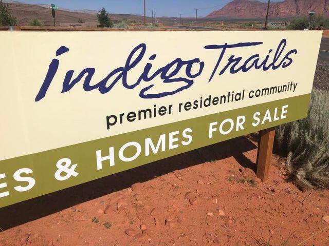 THIS VIEW LOT IS IN THE PRESTIGIOUS INDIGO TRAILS SUBDIVISION. HOMES RANGE FROM $900,000 AND UP. A 40 ACRE SUBDIVISION IN THE CITY OF IVINS WITH TERRIFIC VIEWS OF THE RED MOUNTAIN & PINE VALLEY MOUNTAIN TO THE NORTH & THE BEAVER DAM MOUNTAINS TO THE WEST. WALKING DISTANCE TO BLM LAND & THE SANTA CLARA RIVER PRESERVE. A CUSTOM HOME SUBDIVISION. BUYER MUST USE DEVELOPER BUILDER TO DESIGN & BUILD