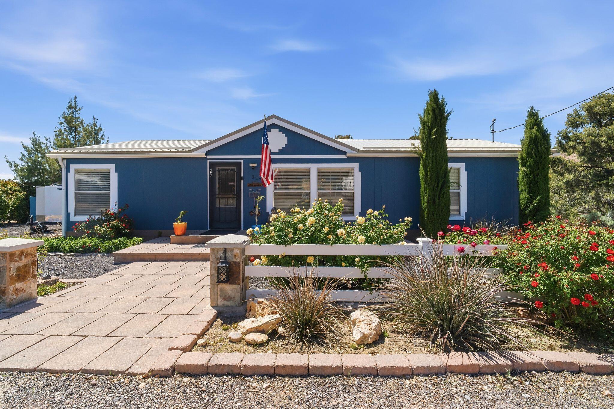 Located in the quiet mountain community of Central, Utah, this well-maintained and thoughtfully updated property offers comfort, usability, and extra space in one of Southern Utah's most desirable rural settings. Situated on a rare double lot totaling .68 acres, this property provides room for additional parking, trailers, recreational vehicles, outdoor storage, or future possibilities while still maintaining a clean and functional layout.

The 3-bedroom, 2-bath home features approximately 1,344 sq ft and has seen extensive updates throughout. Recent improvements include a remodeled kitchen, updated secondary bathroom, new flooring, and exterior repaint completed in 2025. The home has been cared for exceptionally well and is move-in ready. Additional upgrades include a brand-new metal roof with snow stops, reverse osmosis water system, grading and landscaping improvements to the additional lot, and multiple exterior storage structures including sheds and covered storage areas that add excellent functionality for tools, toys, equipment, or seasonal storage. Furniture may be purchased separately.

Located on a paved road with year-round access, the property offers the ideal balance of peaceful mountain living and convenience. Central is known for its mild four-season climate at approximately 5,280 feet in elevation, providing cooler temperatures than nearby desert communities while still being only about 30 minutes from St. George shopping, restaurants, medical facilities, and services. Outdoor enthusiasts will appreciate the close proximity to expansive public lands, trails, ATV access, hiking, hunting, and endless recreation opportunities right nearby.

Whether you are looking for a full-time residence, mountain getaway, or investment property with room to spread out, this updated home and oversized lot offer a rare opportunity in a growing Southern Utah community.