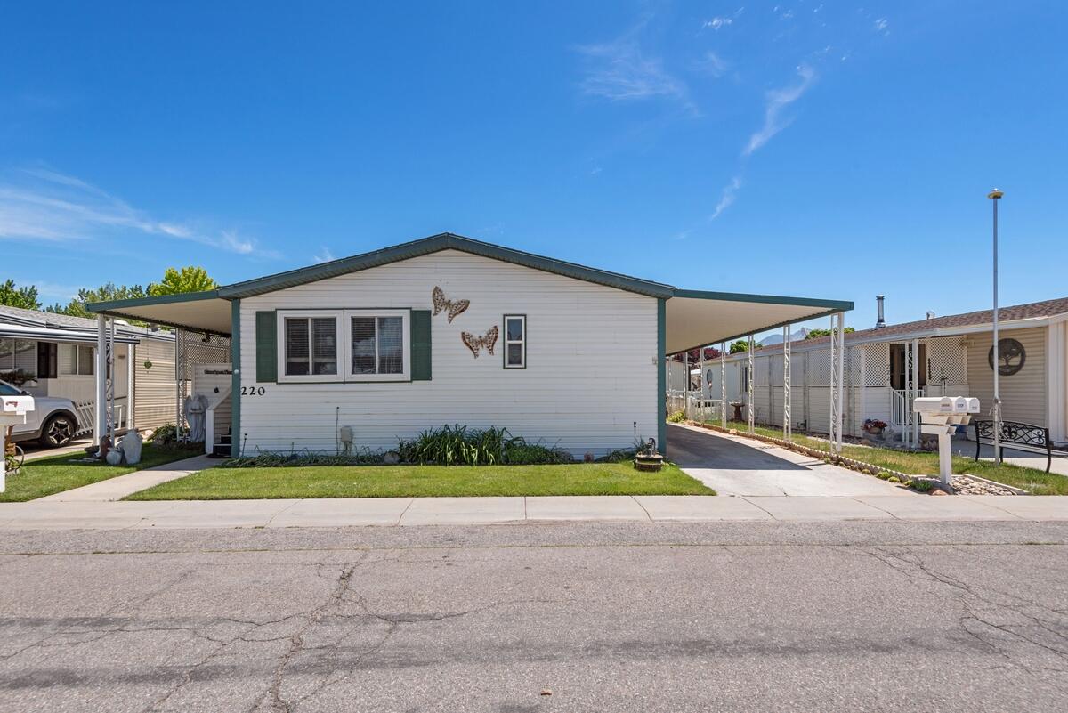Located in a highly desirable 55+ community, this spacious double-wide offers 3 bedrooms, inviting living spaces, and beautifully maintained landscaping. Features include a large primary suite with garden tub, covered parking, storage shed, and RV parking availability. Enjoy community amenities including a pool, hot tub, clubhouse, library, game room, fitness center, and regular social activities. Well-maintained community with an active and welcoming lifestyle. Tools in the shed and additional items are negotiable with the sale, property is ''sold as is'', and is priced to sell.
