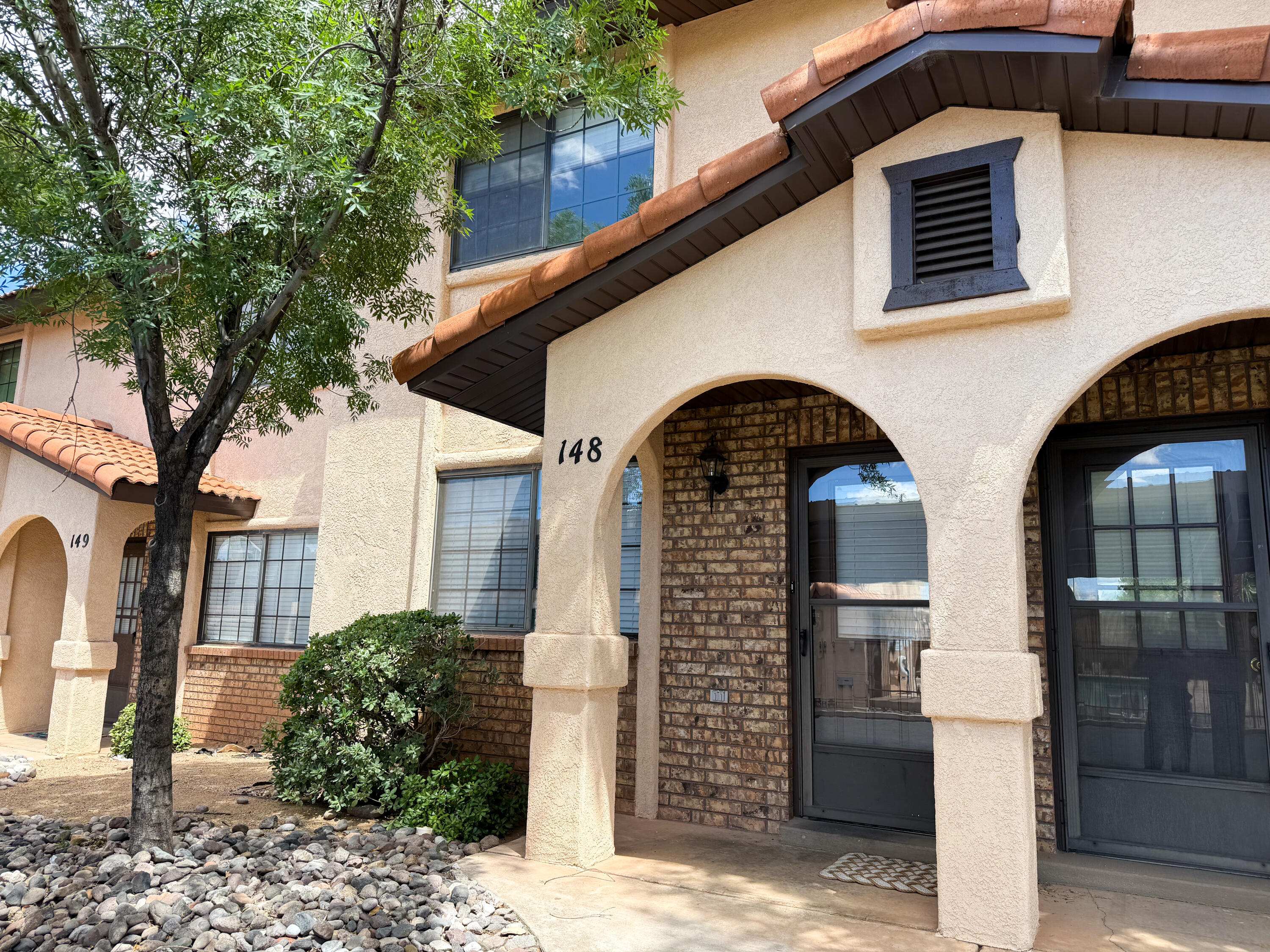 Super cute, updated 2-bedroom, 1.5-bath, 2-car covered-carport townhome in St George! Updates include interior and exterior paint, LVP flooring on both levels, water heater, stainless steel refrigerator, stove, and microhood. Great location right across from the pool! The master bedroom has two closets, a linen closet, and a lovely deck. This home also has fully fenced backyard with a gate. Near shopping, theaters, hiking, biking, and more. Owner/Agent