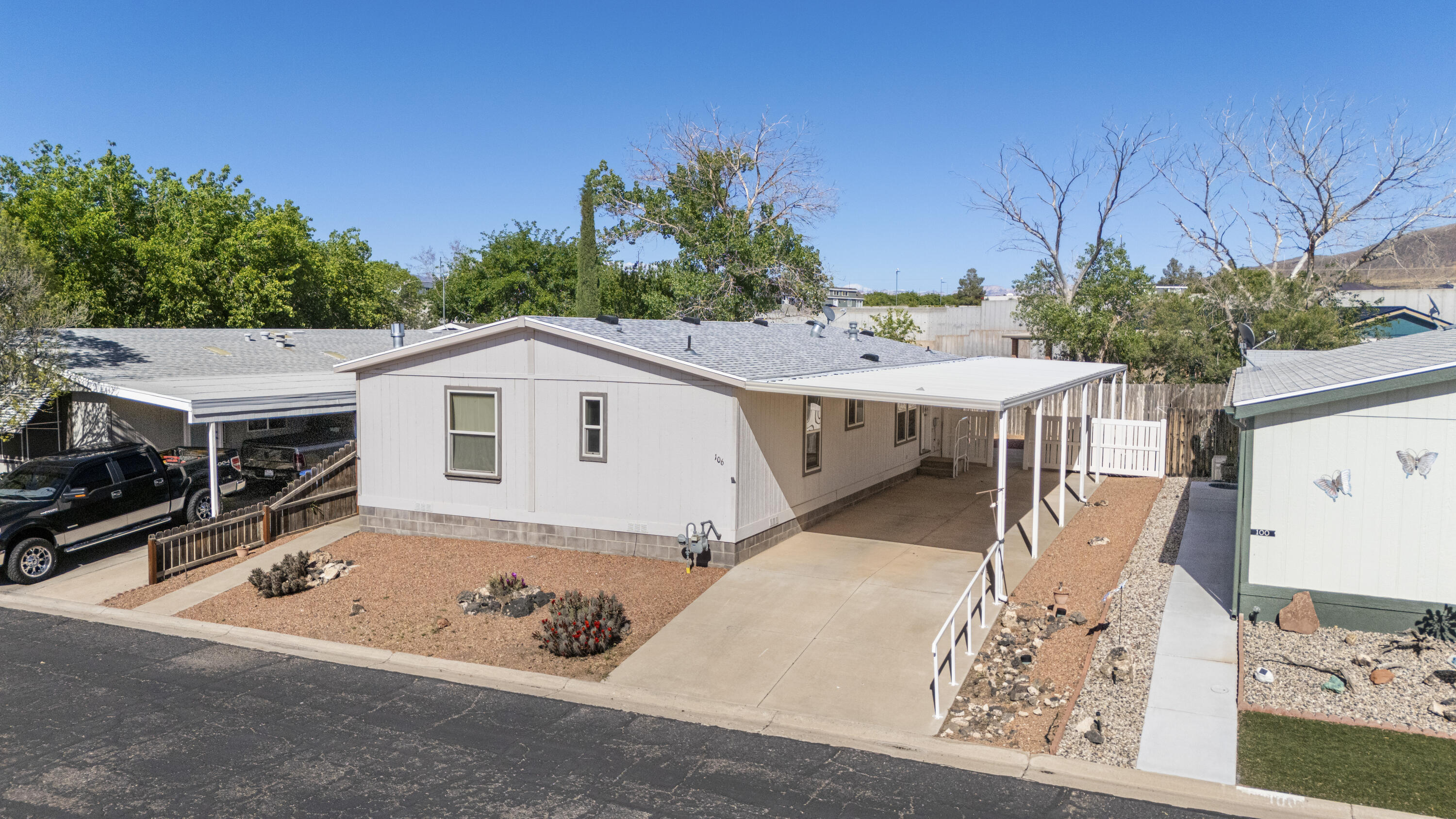 Welcome to the desirable Lava Bluff Community, a welcoming 55+ community in Hurricane designed for comfort, convenience, and easy living. Situated on its own lot, this lovingly maintained home offers the added benefit of land ownership along with a low-maintenance lifestyle. Ideally located near the clubhouse and mailbox, the home has had only one owner who has taken exceptional pride in caring for it over the years. Recent updates include a new roof and new carpet in the living room, giving the home a fresh, move-in-ready feel. Outside, enjoy easy-care landscaping so you can spend less time on upkeep and more time enjoying the lifestyle and amenities the community has to offer.