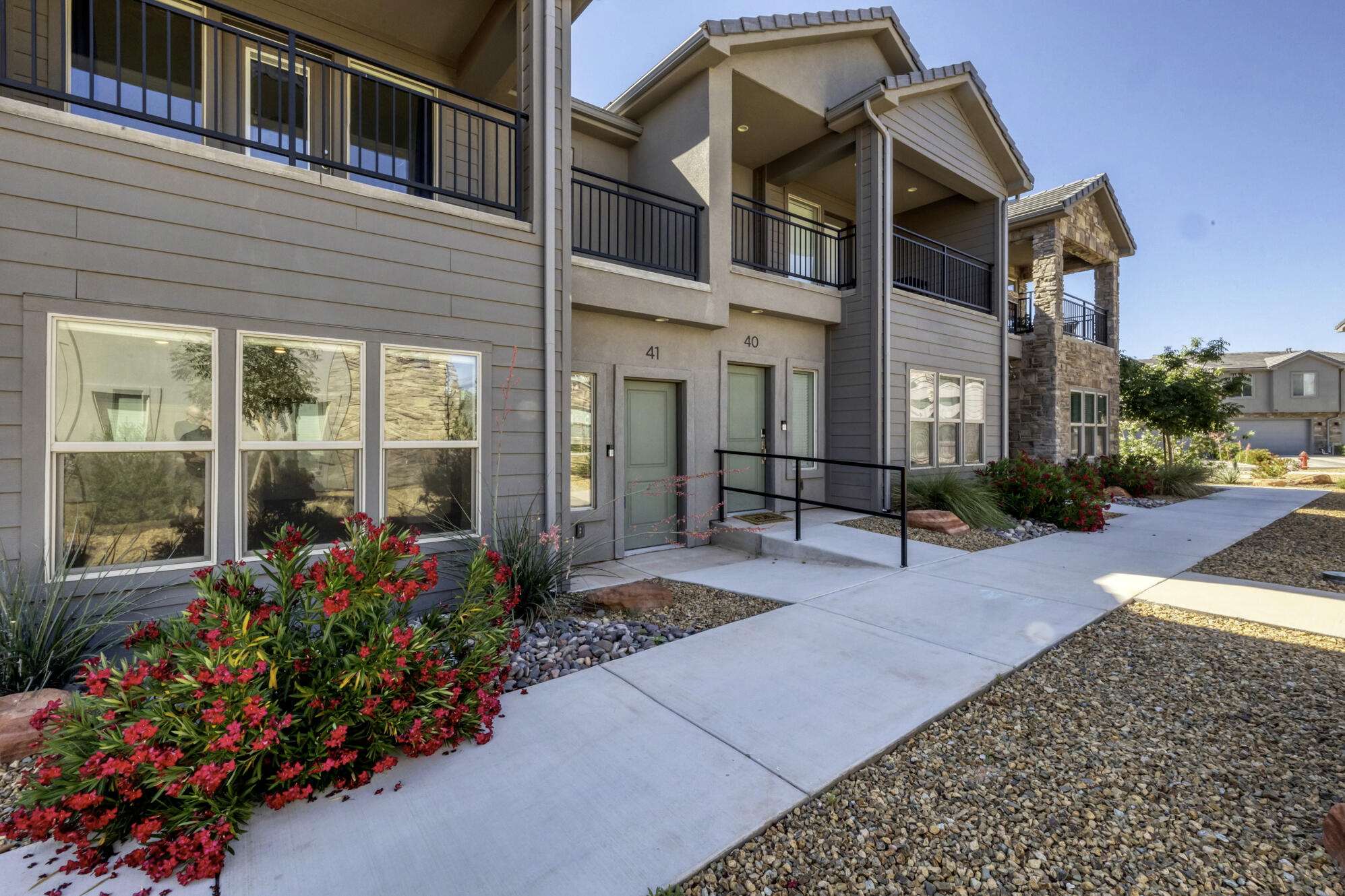 Stunning Modern Townhome in Ivins! Welcome to this nearly-new 1,652 sq. ft. two-story townhouse located in the desirable Azalea Townhomes community. Built in 2022 and priced at $418,000, this residence offers a contemporary lifestyle with 3 spacious bedrooms and 3 bathrooms. The thoughtful layout features 826 sq. ft. on the main level and another 826 sq. ft. on the second story, providing a perfect balance of open living space and private quarters. The primary suite serves as a true retreat, featuring a private attached balcony perfect for enjoying the fresh air and stunning local views.
The interior is designed for comfort and modern convenience, boasting central electric air conditioning and forced air heating. This home is exceptionally turn-key, as the sale includes a brand-new fridge, washer, and dryer, along with a microwave and all window shades. For added utility, the property features soft water hookups that are already installed and ready for immediate use. Parking and sustainability meet in the 2-car deep carport/garage, which comes equipped with an electric car charger already in place.
Residents of Azalea Townhomes enjoy premier community perks, including access to a sparkling pool and relaxing spa. The $153 monthly HOA fee covers these amenities while maintaining the community's high standards. Located in the Washington School District, this property is zoned for Red Mountain Elementary and the highly-regarded Snow Canyon High School. Whether you are seeking a primary residence or a low-maintenance getaway near the red rocks, this Ivins gem is an incredible opportunity.
Square footage figures are provided as courtesy estimates only and were obtained from county records. Buyer is advised to obtain an independent measurement.