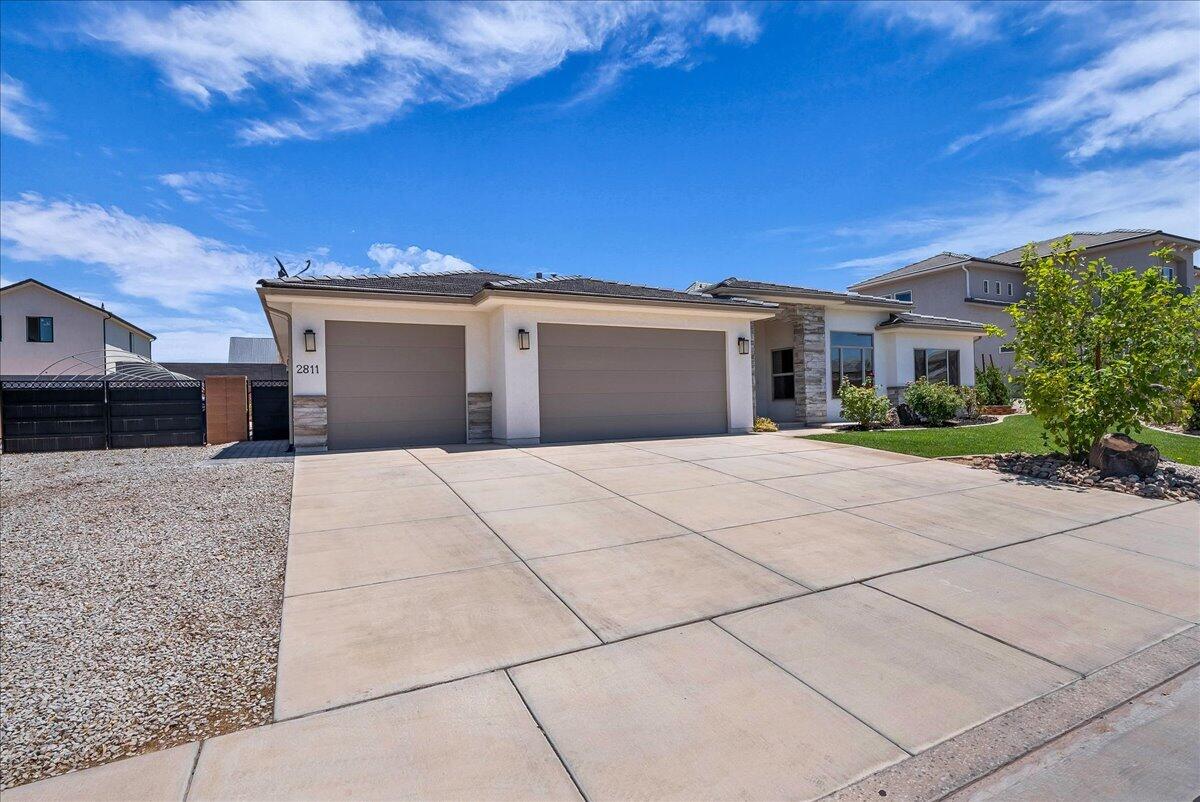 Rare Little Valley opportunity! This beautifully maintained 4-bedroom home with a dedicated den offers the perfect blend of comfort, functionality, and outdoor living. Thoughtfully designed with a spacious floor plan, this home provides plenty of room for both everyday living and entertaining. The versatile den is ideal for a home office, playroom, fitness room, or hobby space. Enjoy cooking and gathering in the open living areas, then step outside to a backyard filled with mature fruit trees, a greenhouse, and plenty of space to relax and enjoy Southern Utah's beautiful weather. The desirable east-facing orientation provides comfortable afternoon shade and helps keep outdoor spaces enjoyable year-round. A 3-car garage with a deep bay and room for RV parking offers excellent storage and flexibility for vehicles, toys, and hobbies. Located in one of St. George's most sought-after neighborhoods, you'll appreciate the proximity to top-rated schools, parks, trails, shopping, and the added benefit of no HOA.