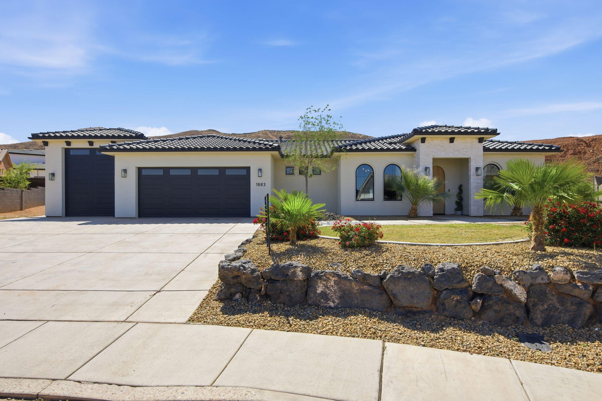 Stunning home in Scenic Sunrise at the end of a cul-de-sac with views, RV garage + parking, and no HOA! This thoughtfully designed property features a bright open layout with luxury vinyl plank flooring, white oak cabinetry, quartzite countertops, and a custom Venetian plaster hood as a true kitchen centerpiece. The kitchen offers a spacious walk-in pantry, designated dining area that leads to the back patio and large island for entertainment. Versatile front casita/salon space with its own entrance offers endless possibilities. Such as, home office, guest suite, or business use. The primary en-suite is complimented by a walk-in closet, walk-in shower, dual sinks and separate soaking tub. Spacious living areas flow seamlessly to the covered patio and backyard, with a retaining wall already in place and seller offering to coat the patio for the buyer if desired.  Located in a welcoming neighborhood with community events and great neighbors, just minutes from shopping, dining, and walking distance to Horizon Elementary. Clean, modern, and move-in ready!